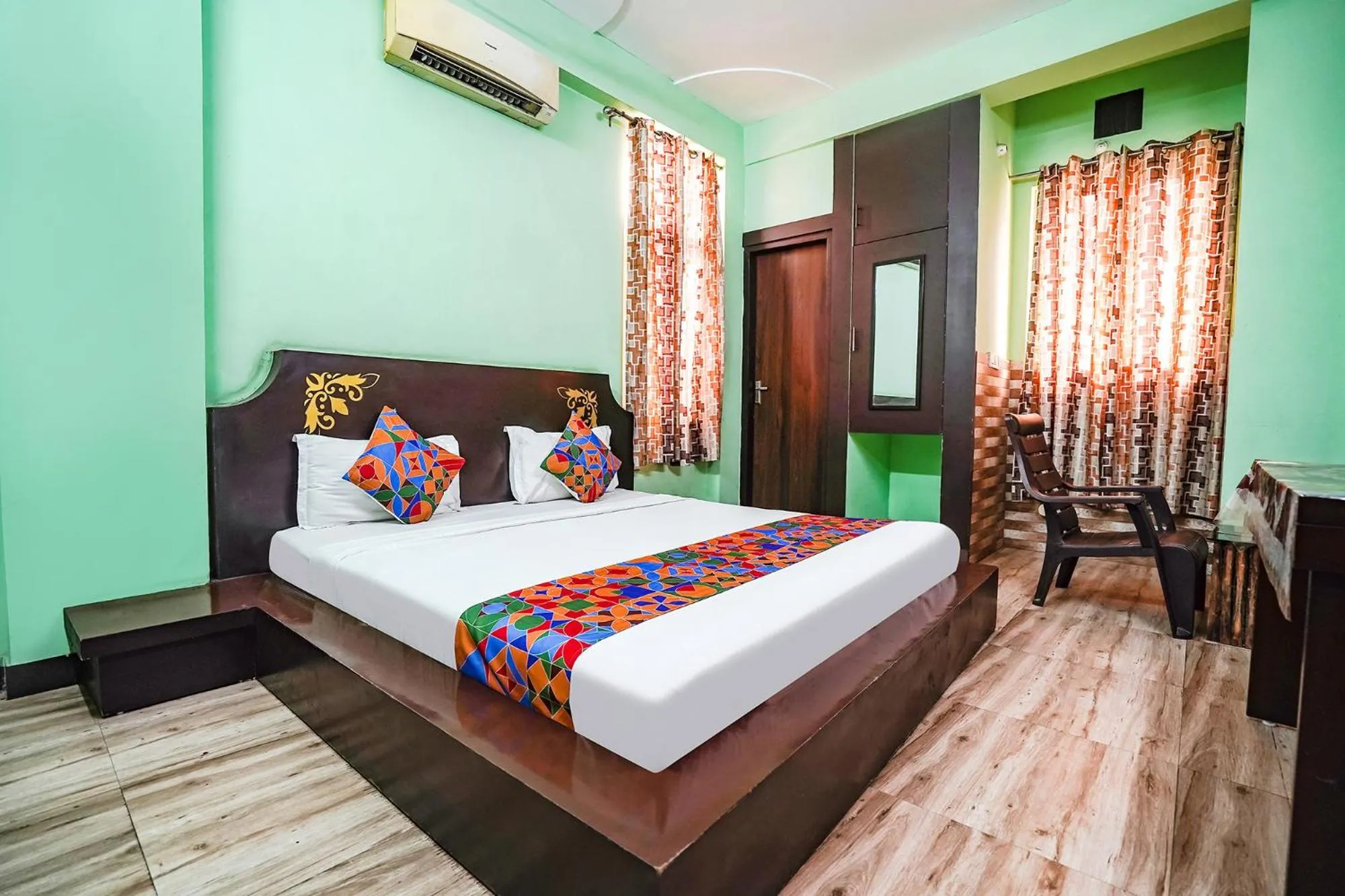 Bed in FabHotel Krishna Heights