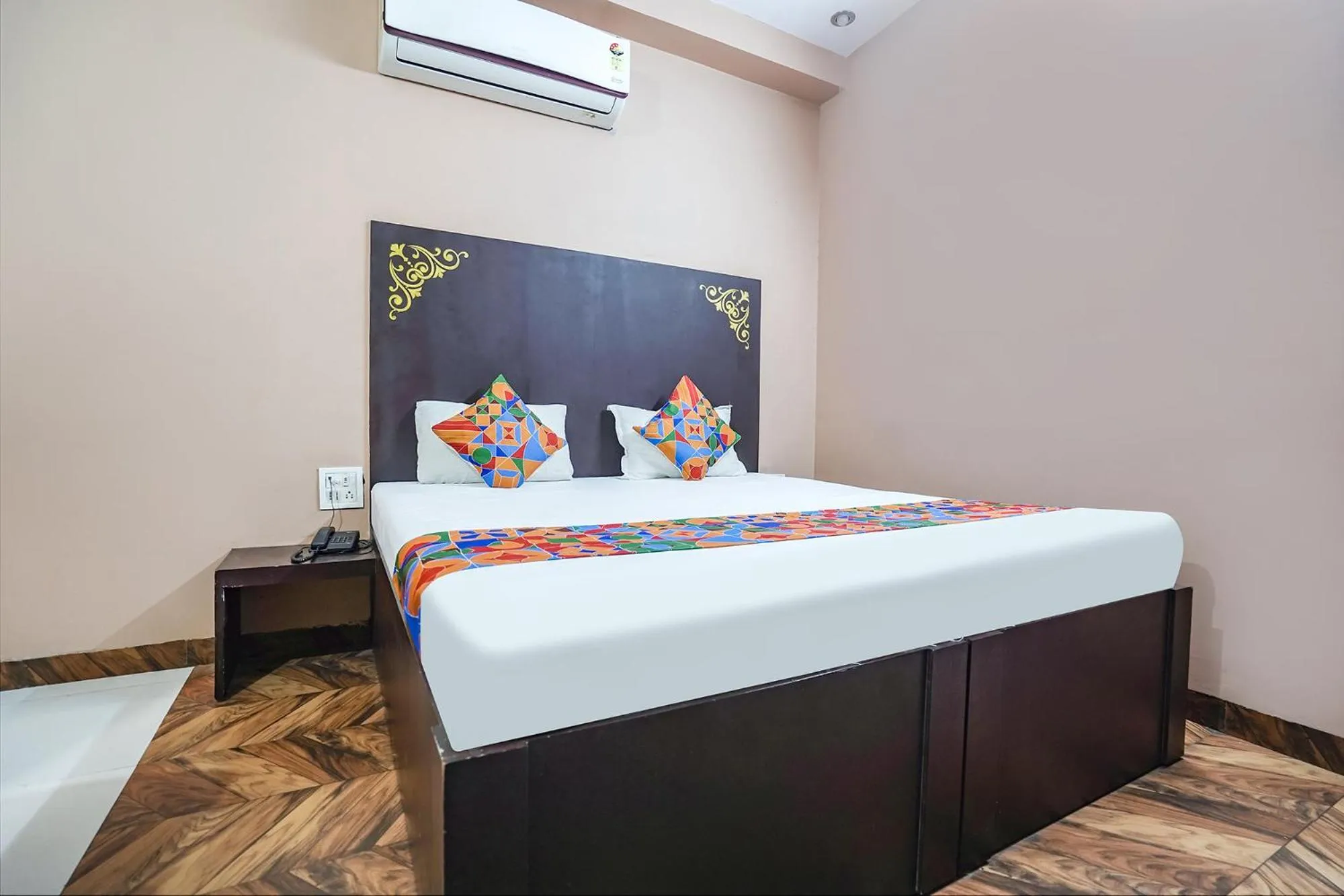 Bed in FabHotel Krishna Heights