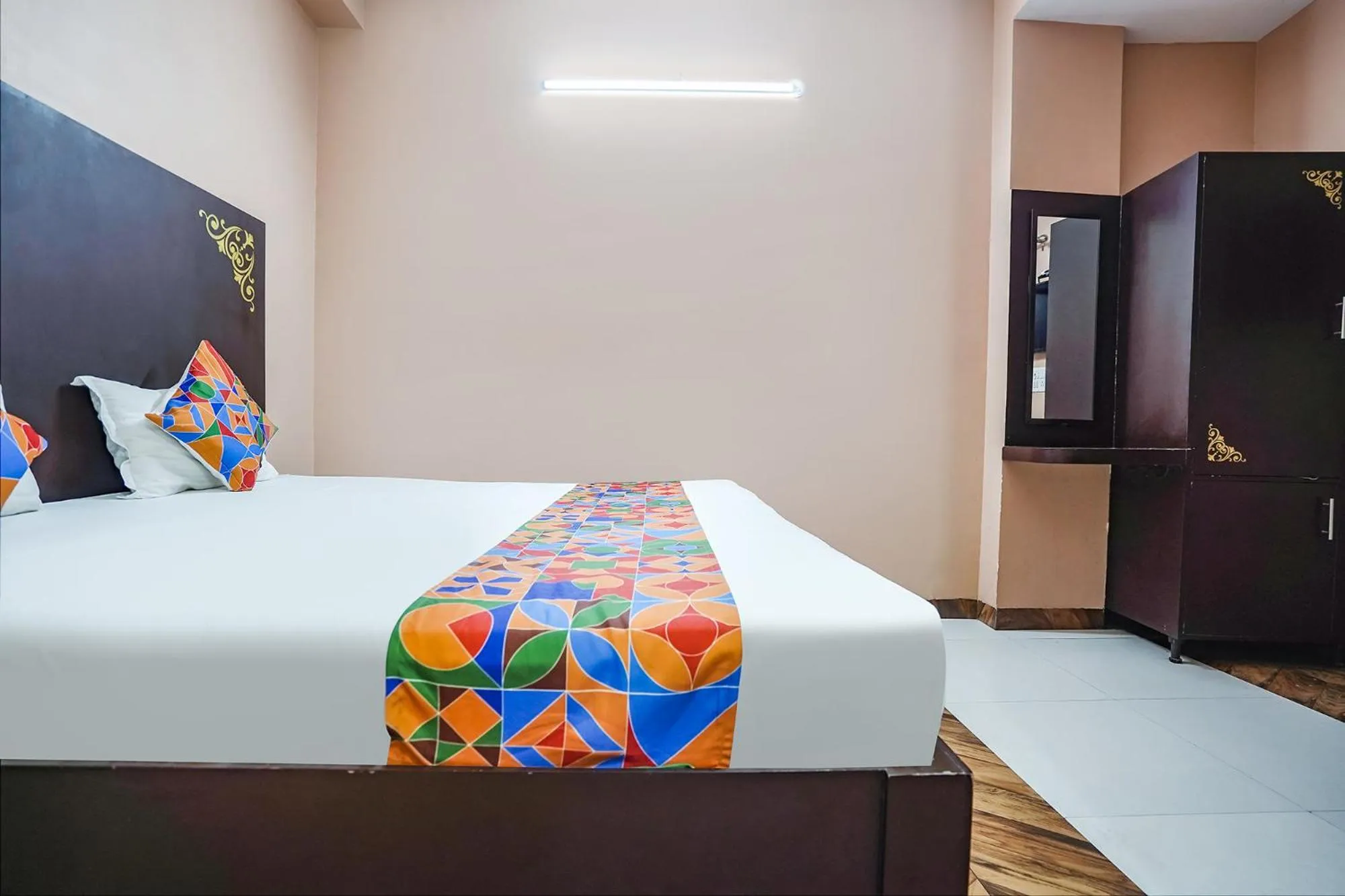 Bed in FabHotel Krishna Heights