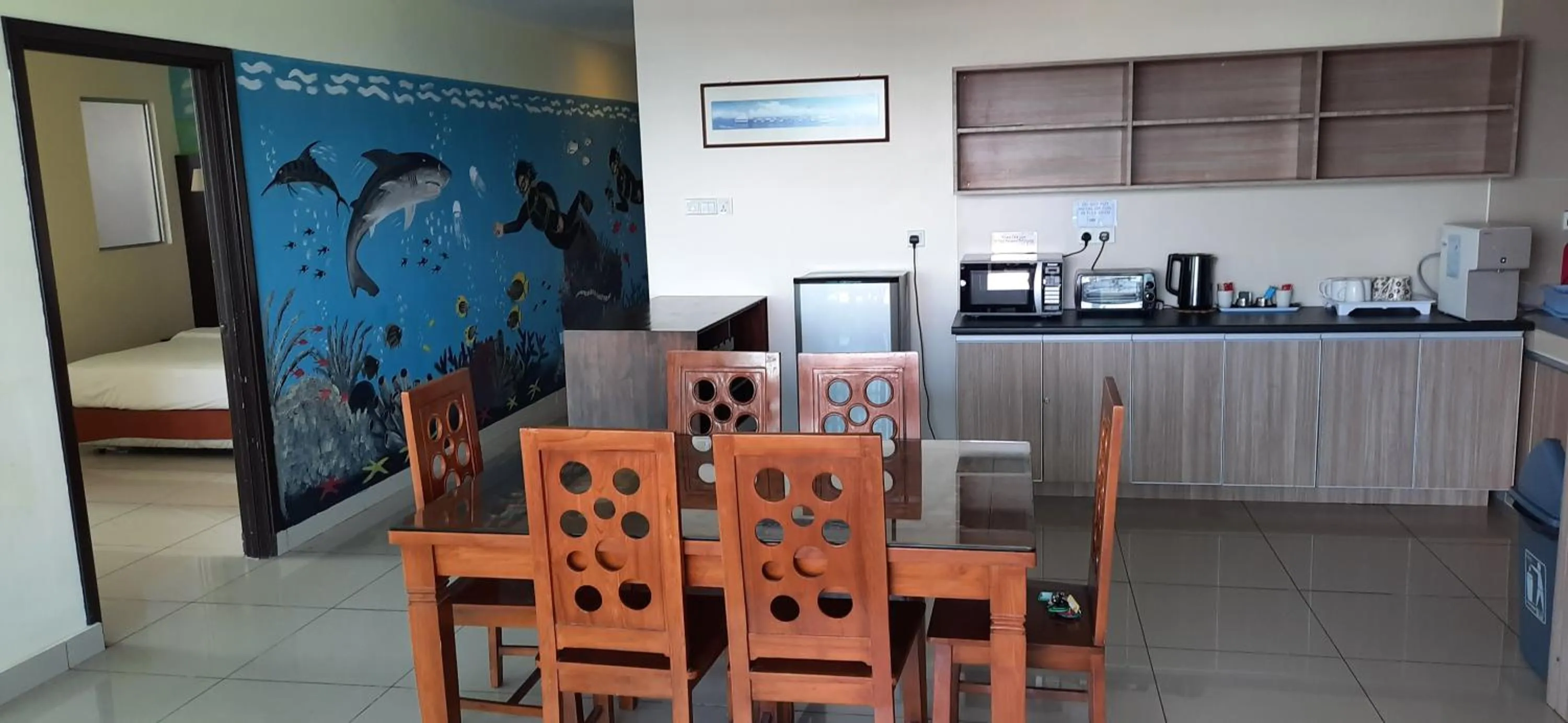 Kitchen or kitchenette in Sipadan Inn Service Apartments Semporna