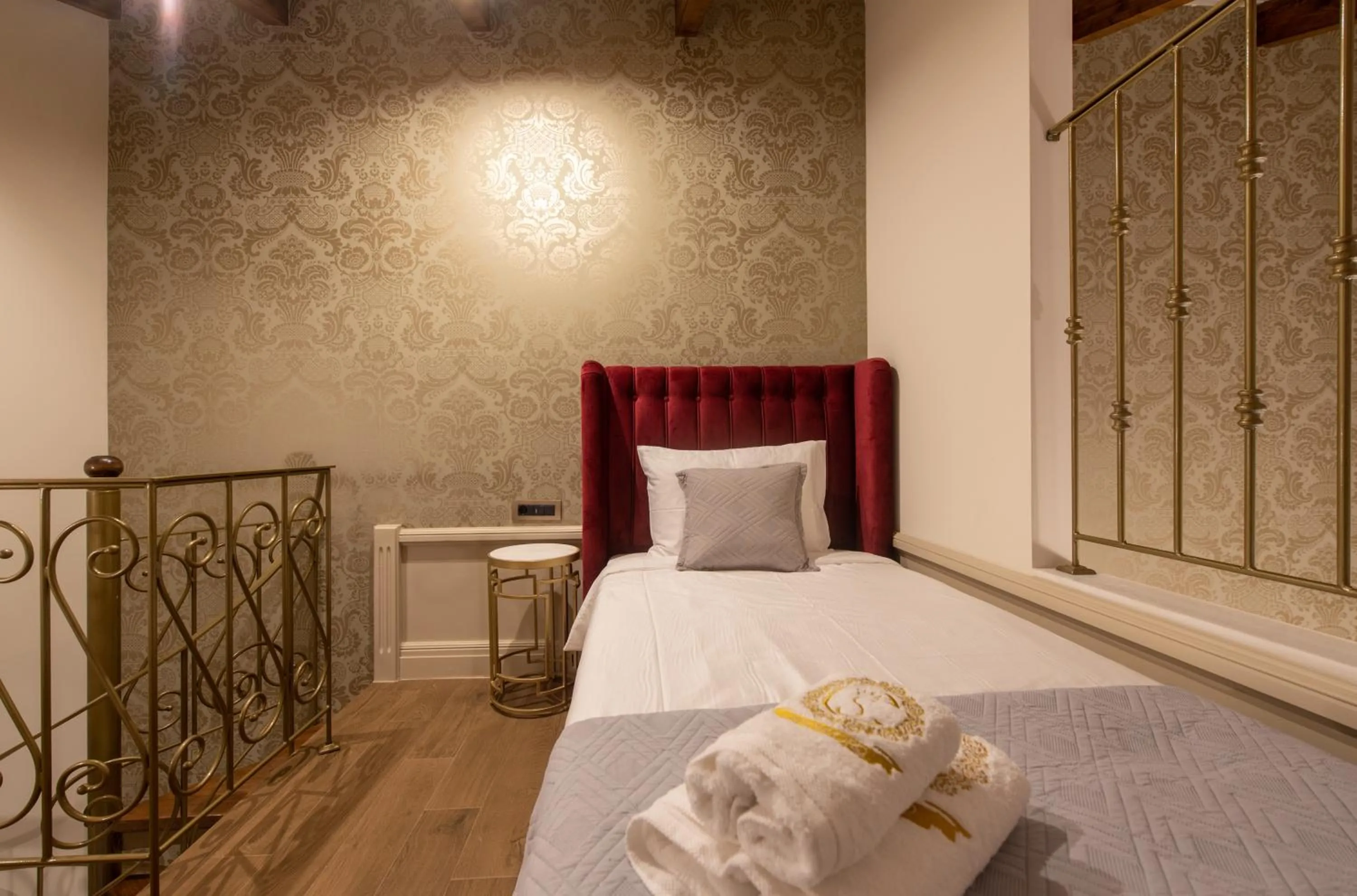 Bed in Capolavoro Suites