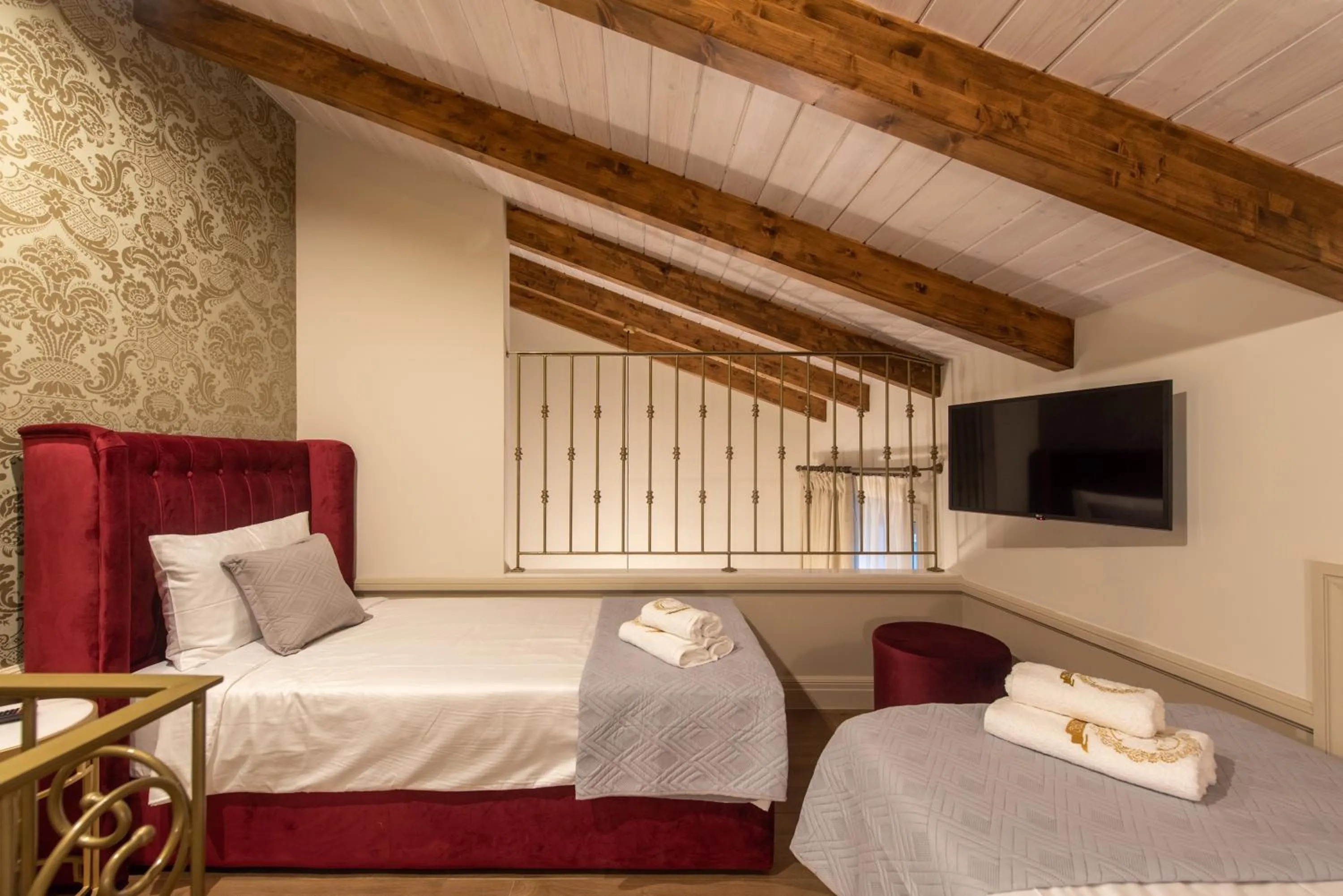 Bed in Capolavoro Suites