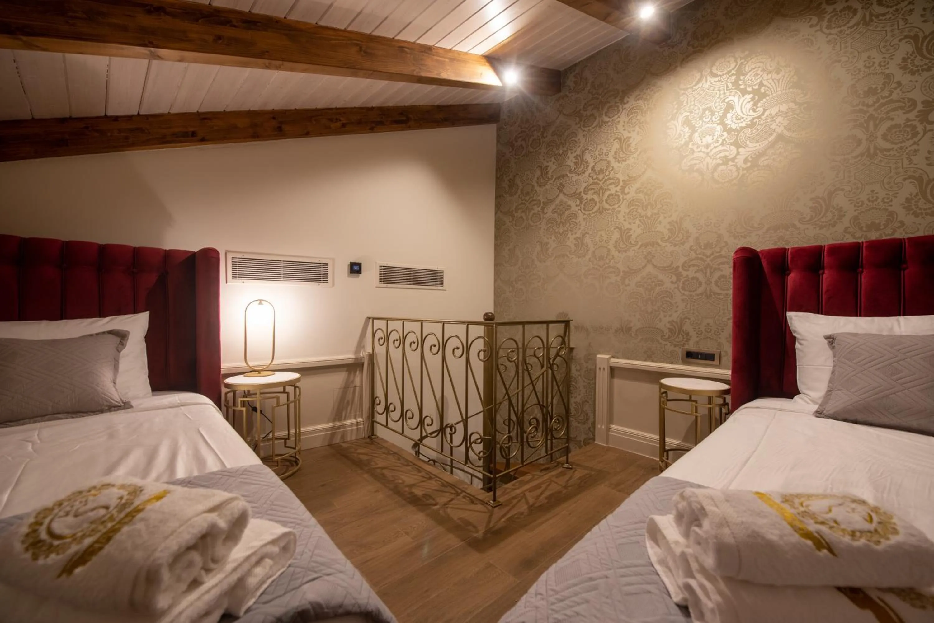 Bed in Capolavoro Suites