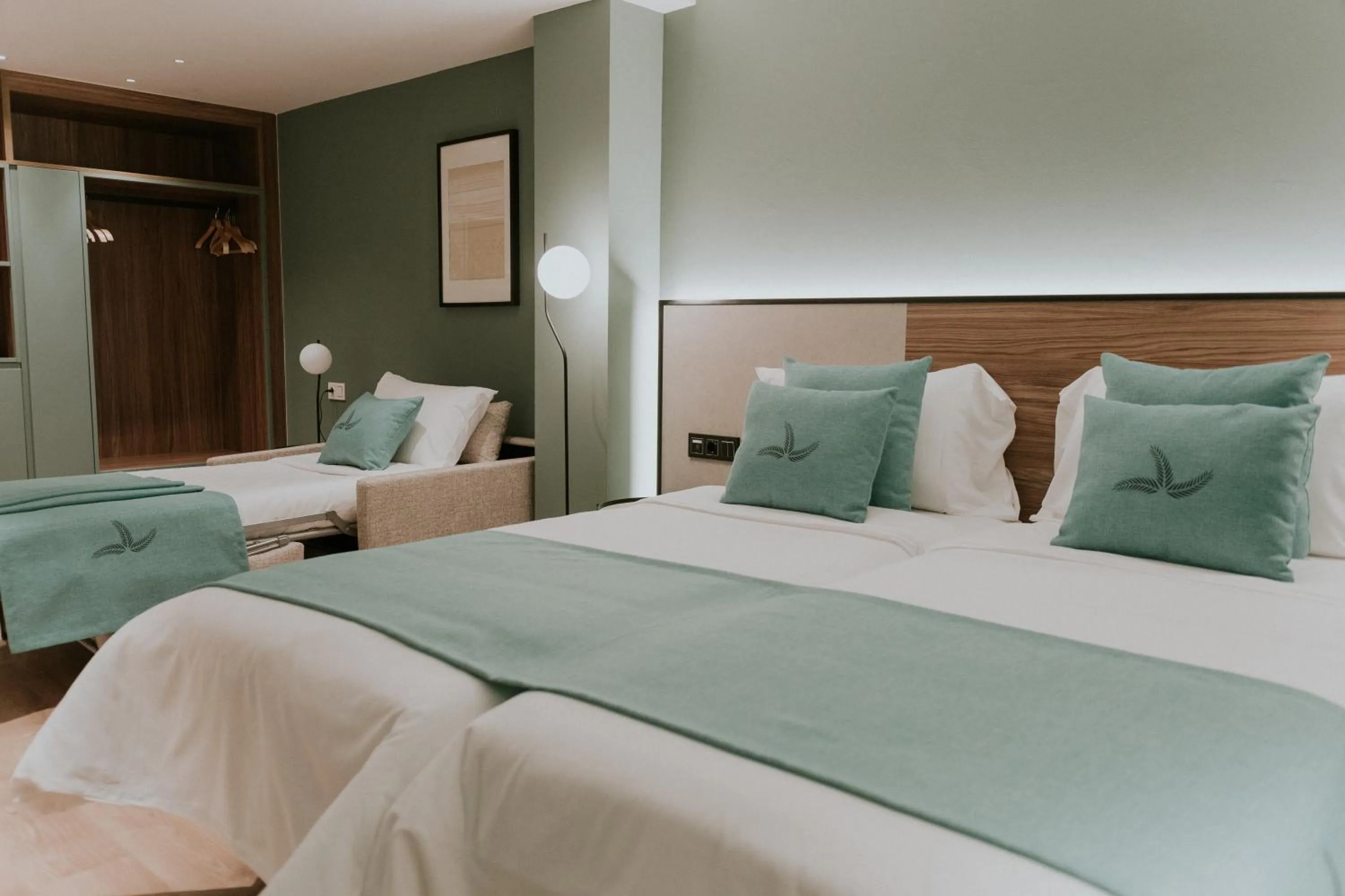 Bed in Catalina Plaza Hotel Sostenible