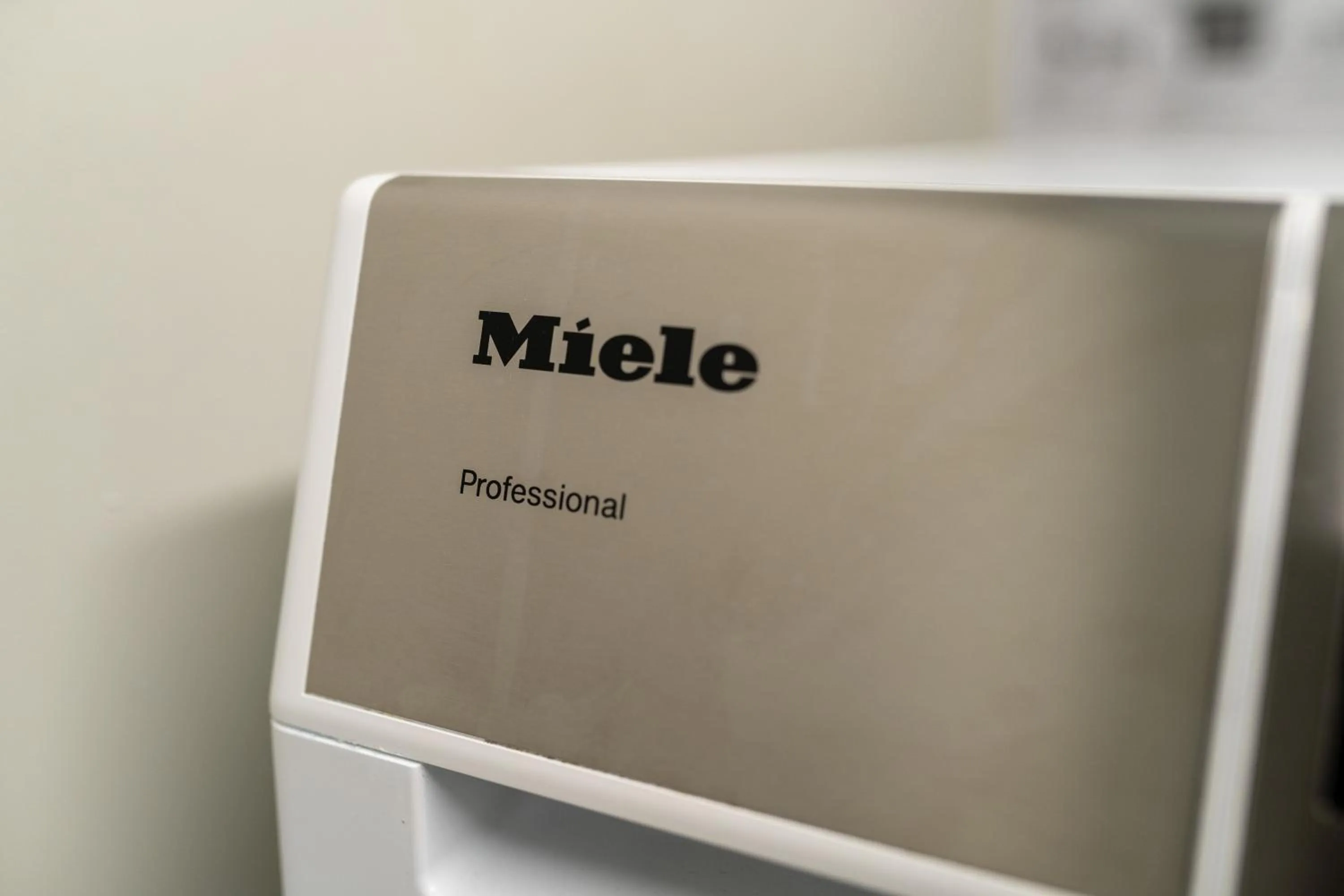 washing machine in Uppsala Hotel Apartments