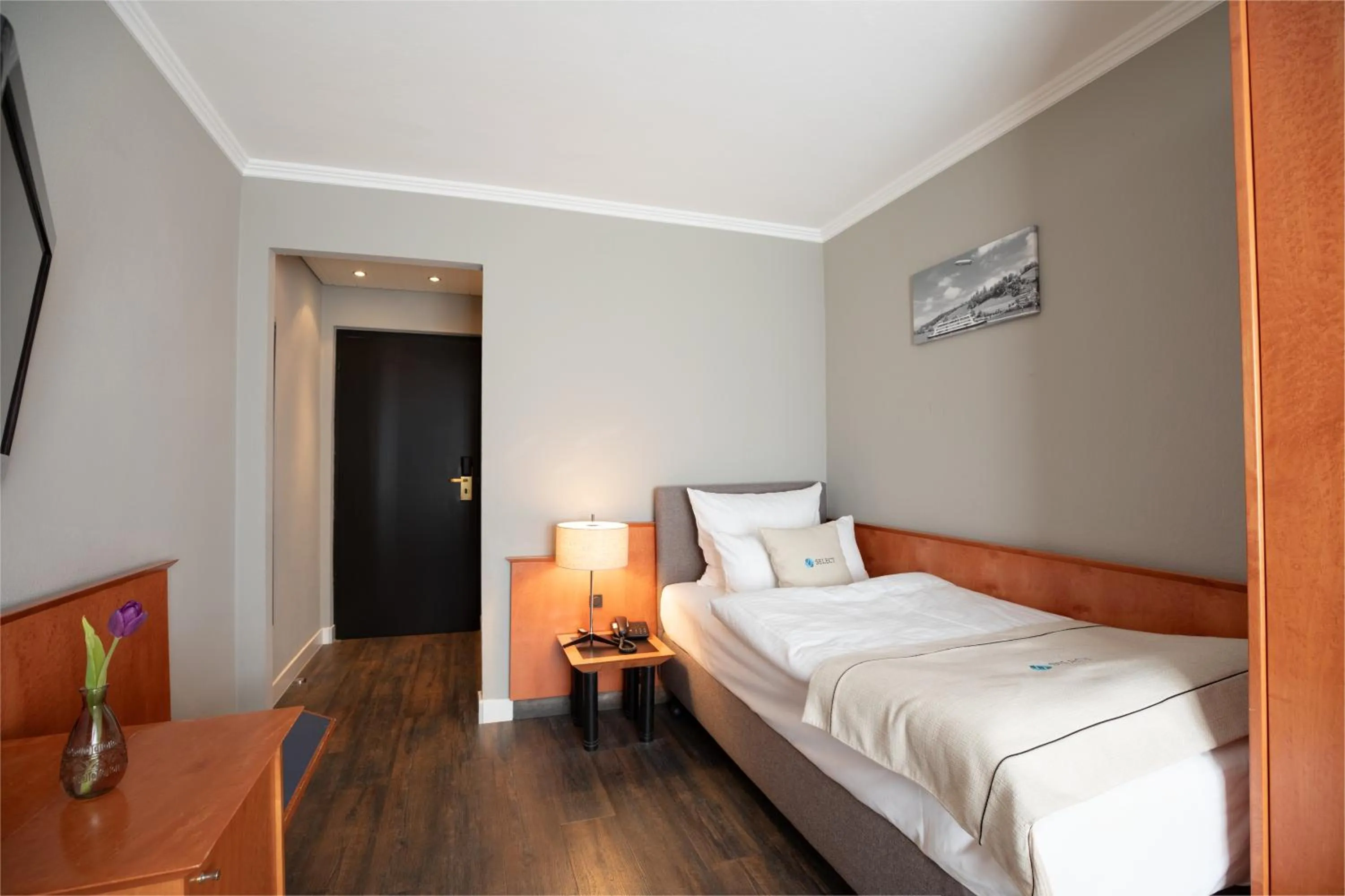 Bed in Select Hotel Friedrichshafen