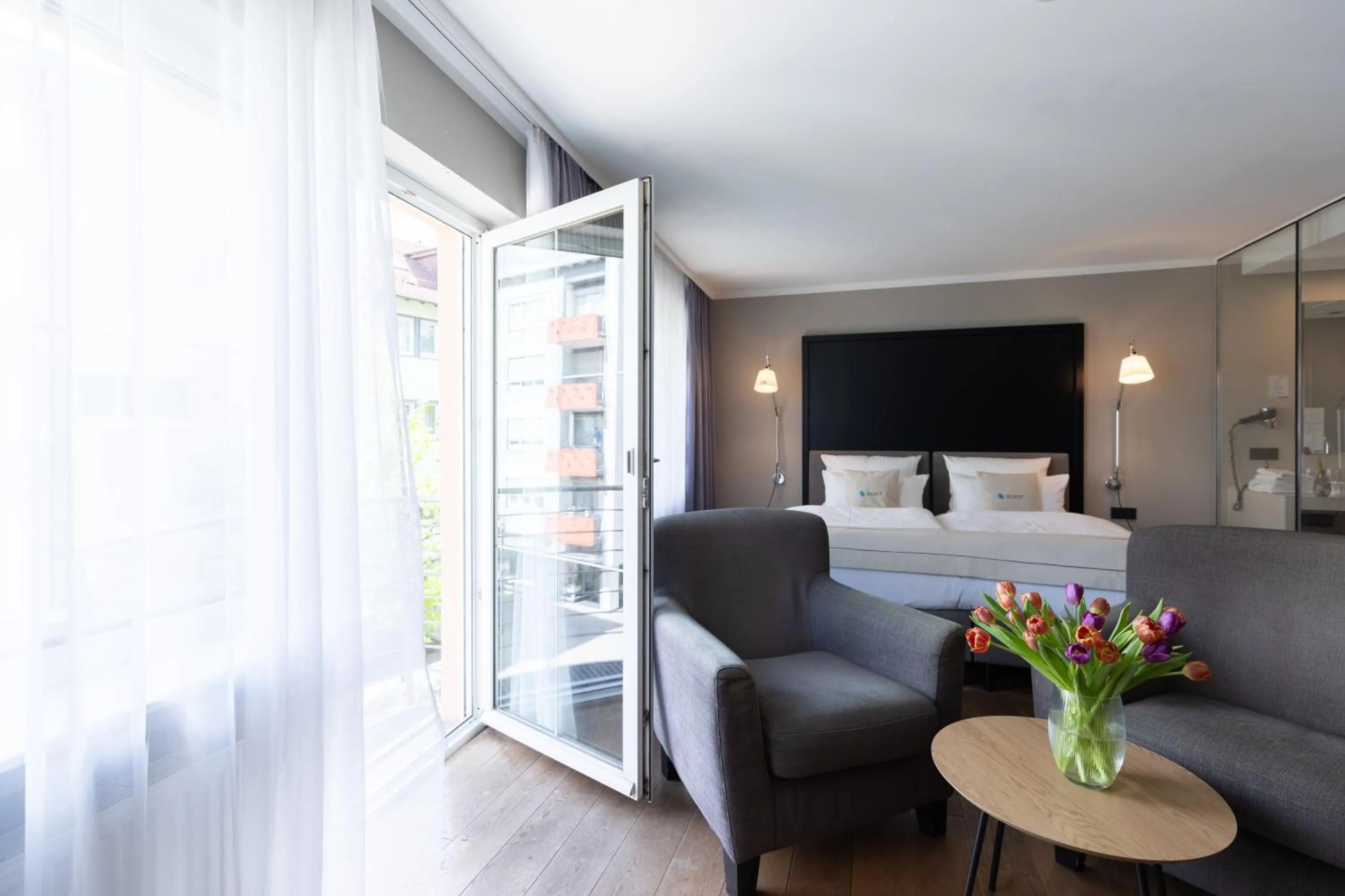 Bed in Select Hotel Friedrichshafen