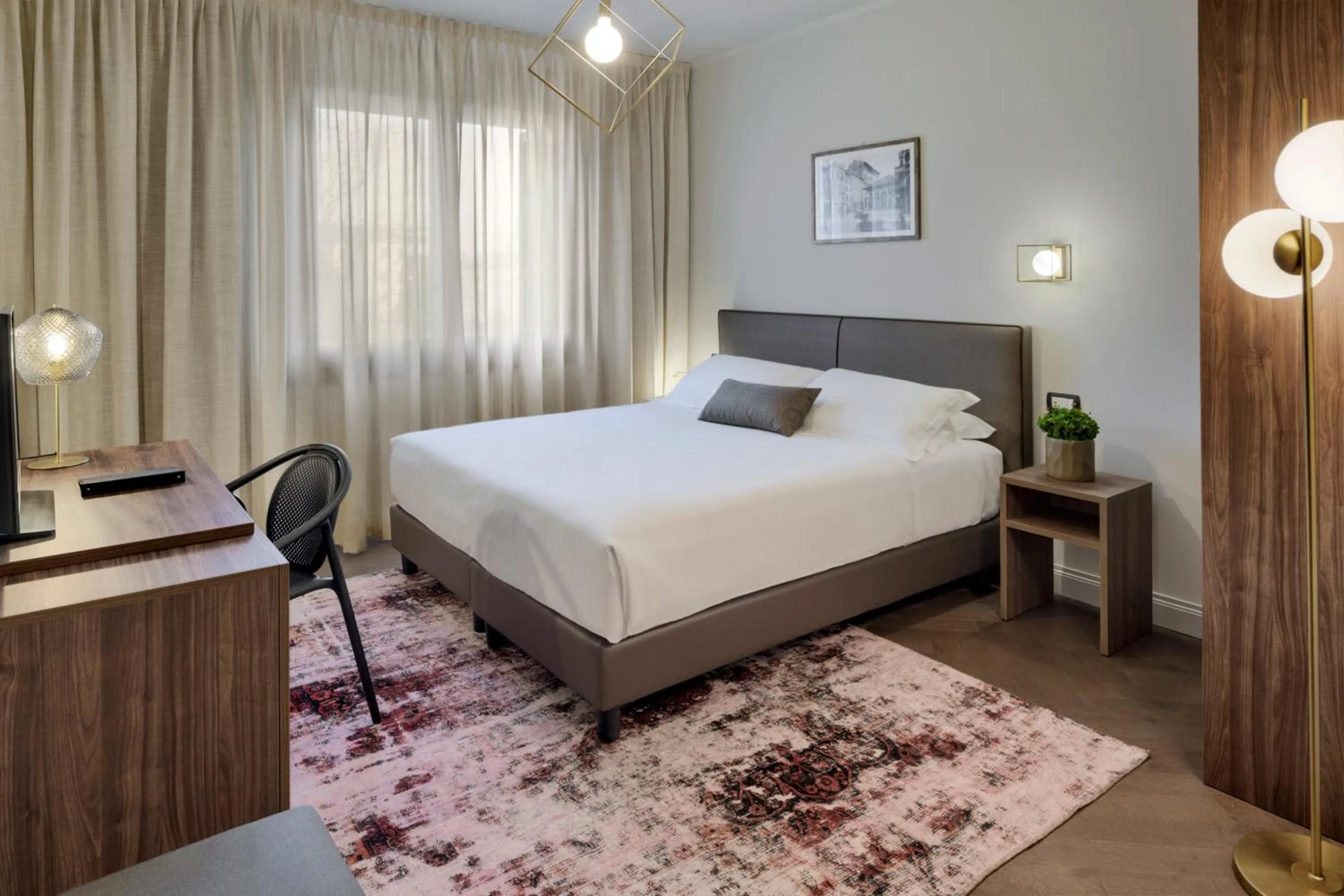 Bed in Porta Altinia Suites