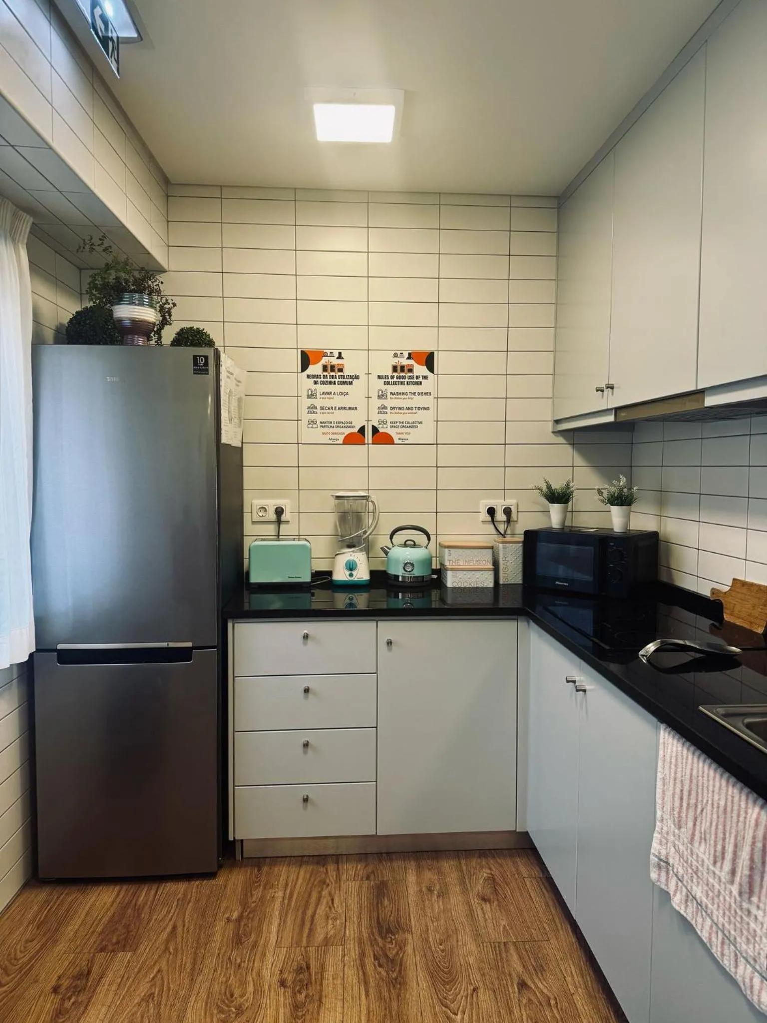 Kitchen or kitchenette in Aliança café & hostel
