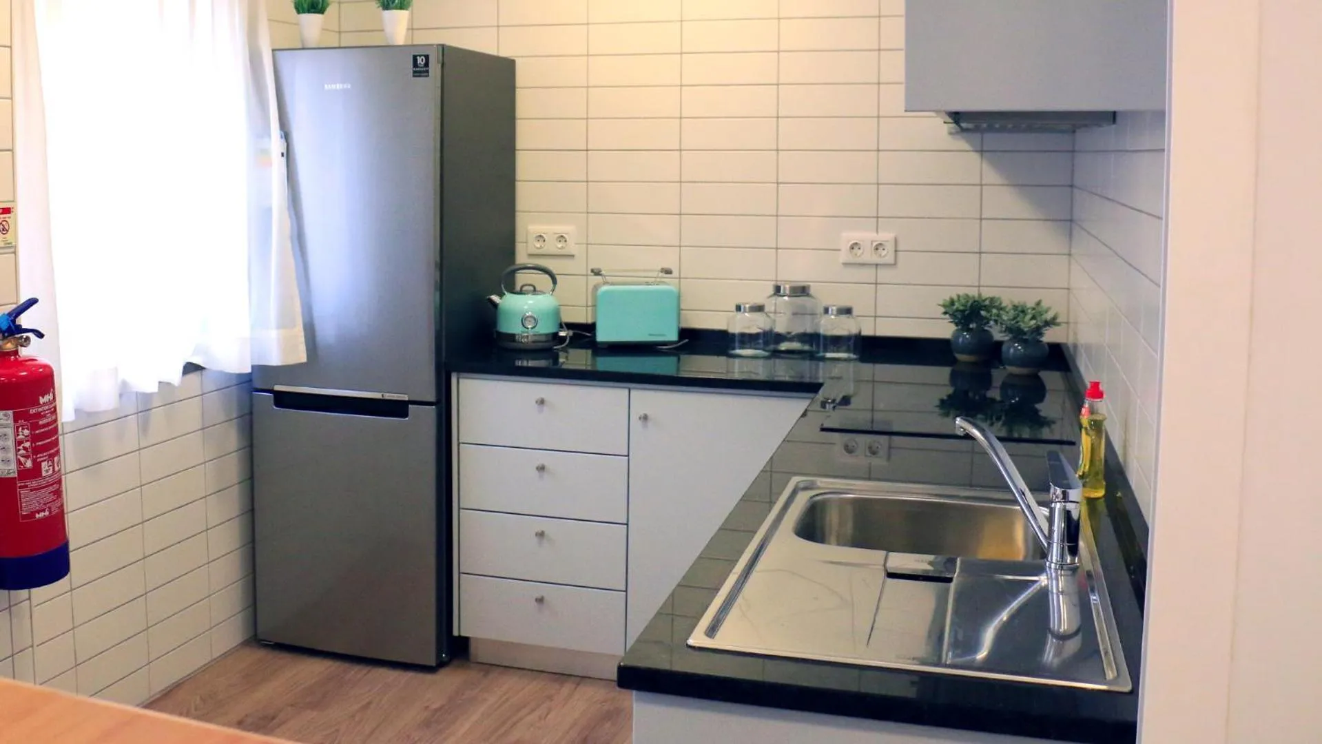 Kitchen or kitchenette in Aliança café & hostel