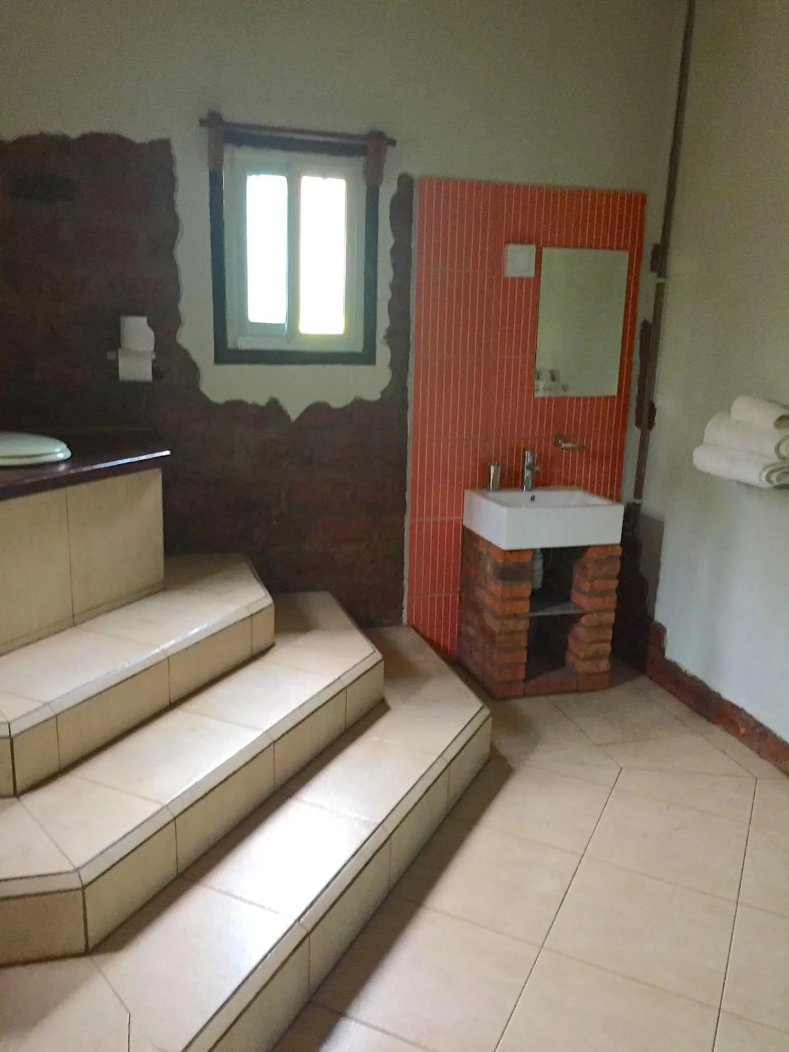 Toilet in Footsteps Eco-Lodge