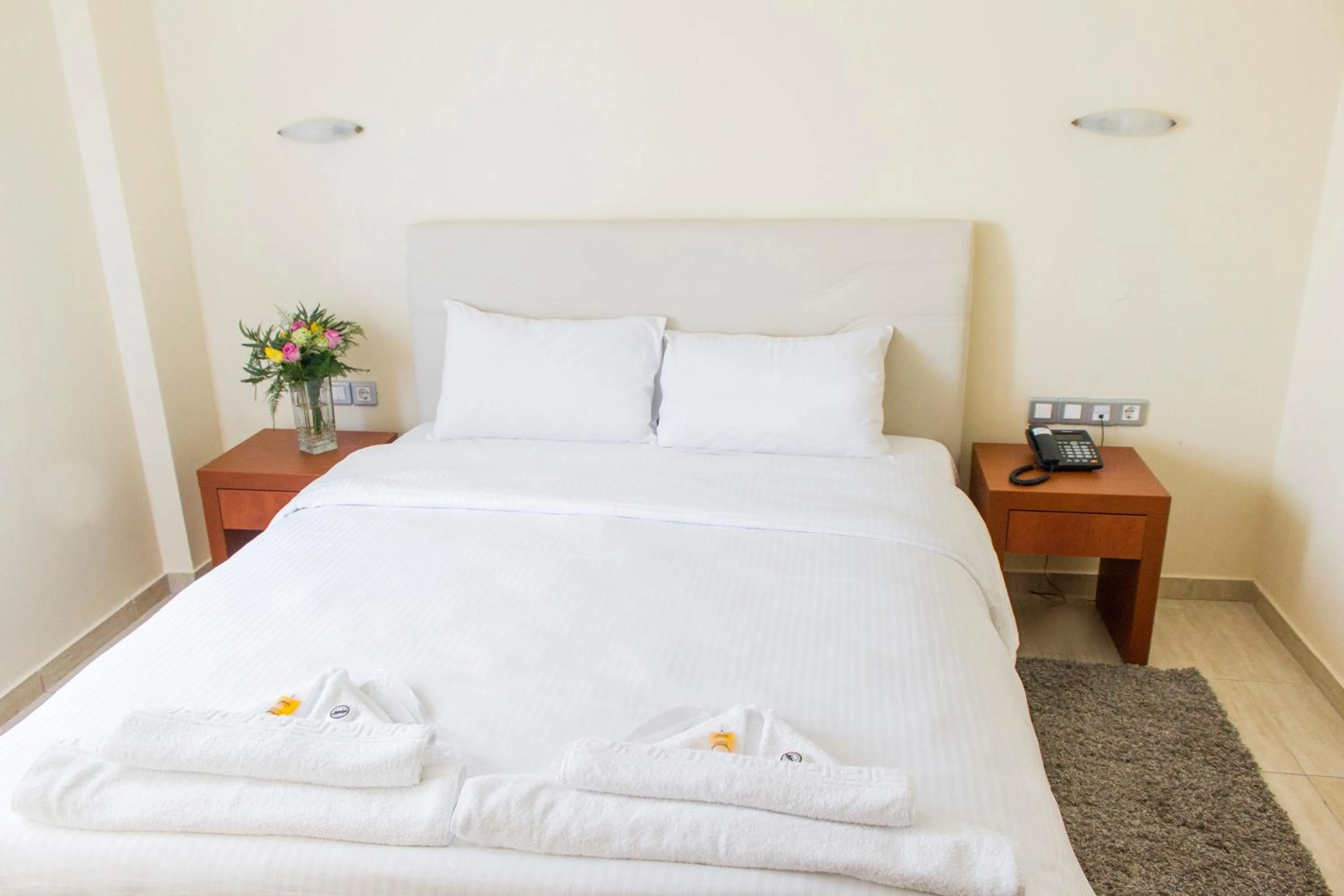 Bed in Thalassa Apart Hotel