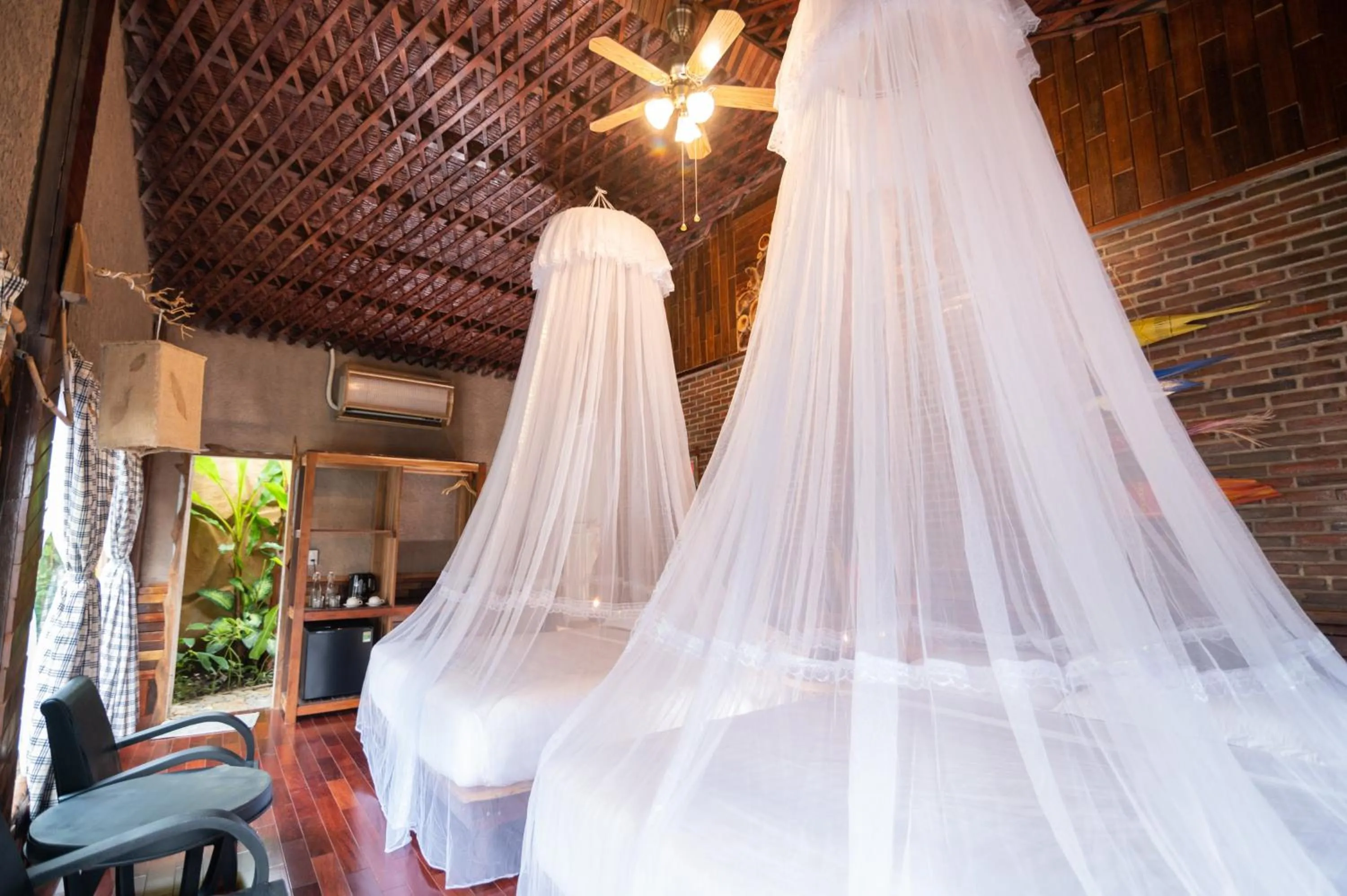 Bed in MEKONG SILT ECOLODGE