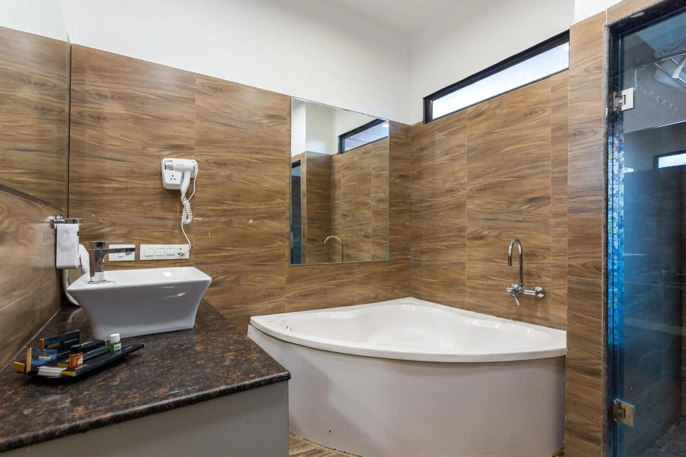 Bathroom in Amara Oceanfront Resort & Club Baga Bathroom in Amara Oceanfront Resort & Club Baga