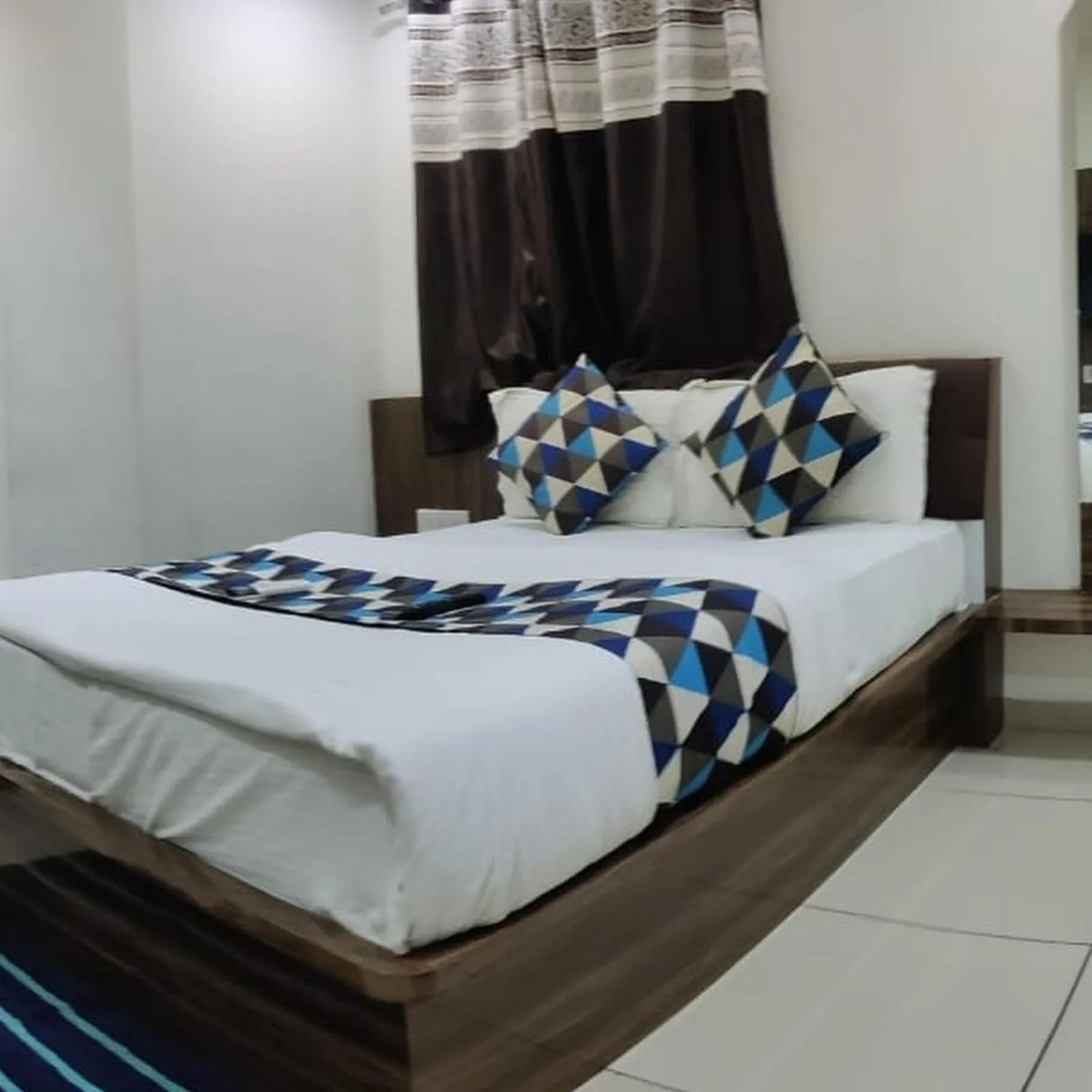 Bed in Hotel Mansarovar,Vadodara