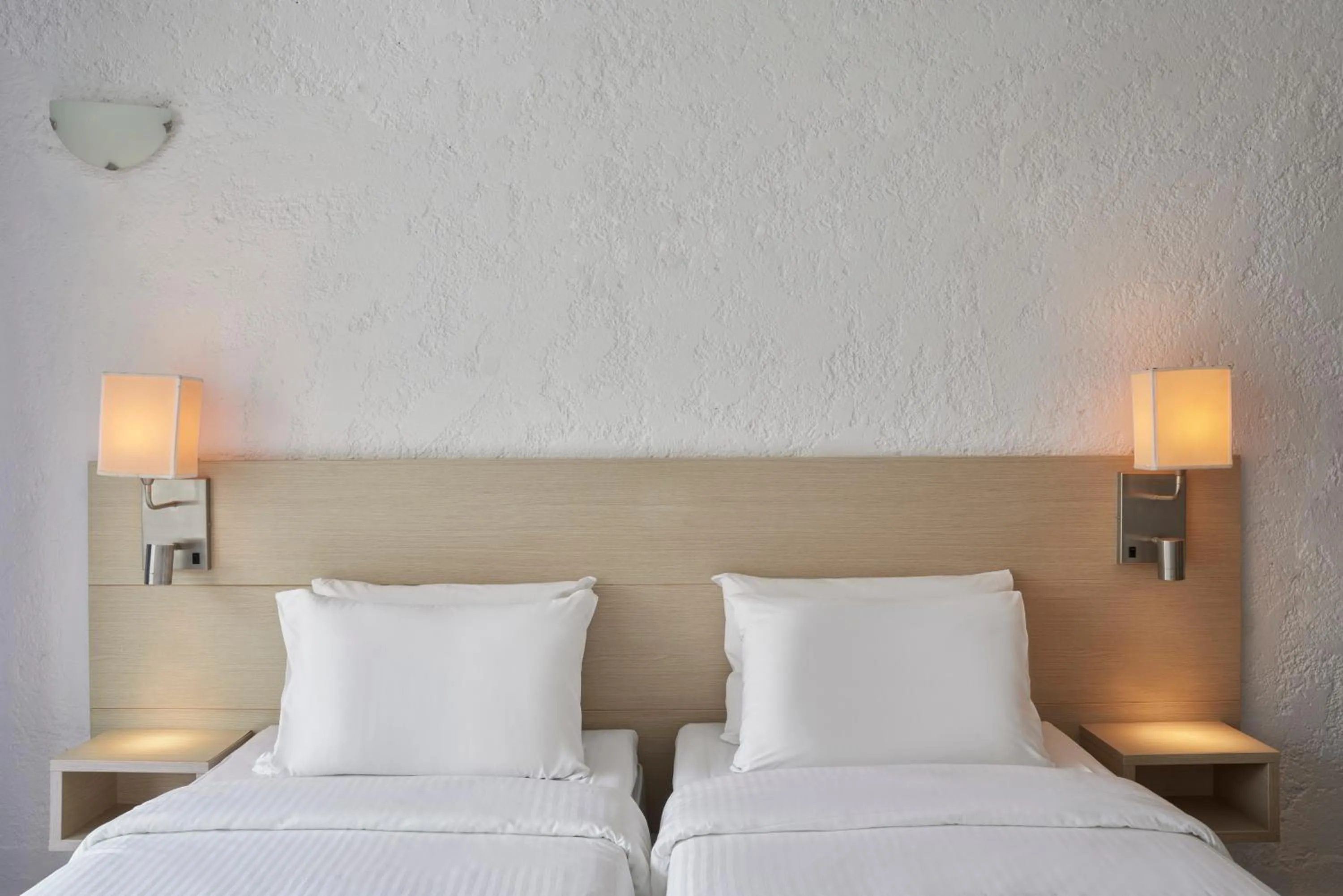 Bed in The Apartments by Esperia