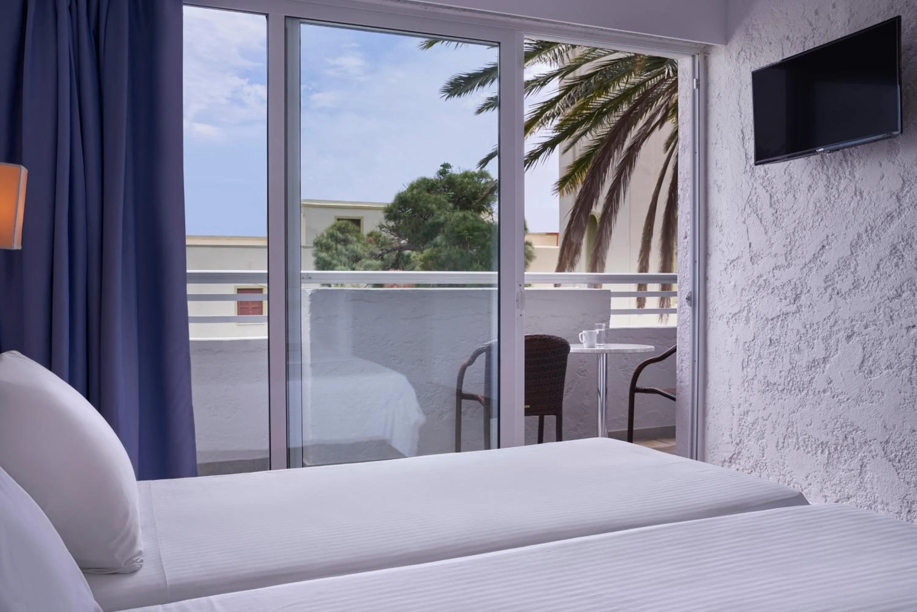 Bed in The Apartments by Esperia