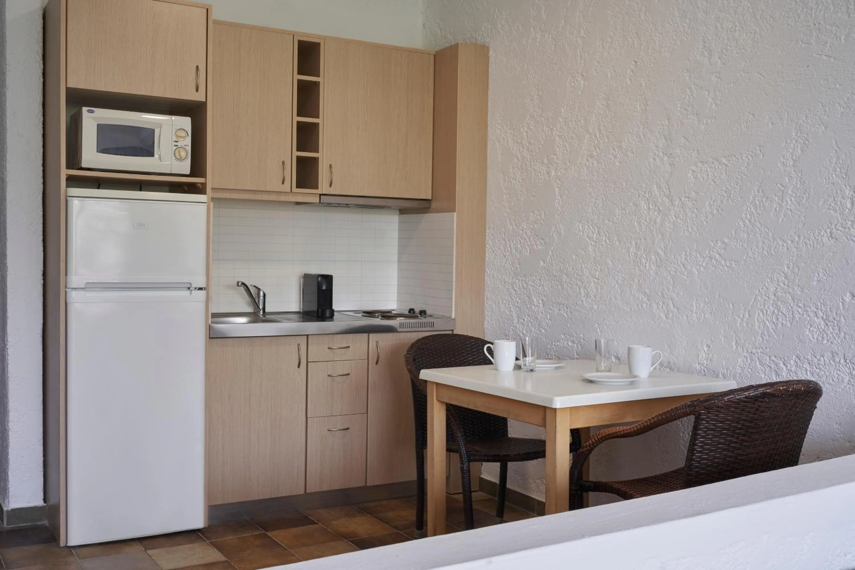 Coffee/tea facilities in The Apartments by Esperia