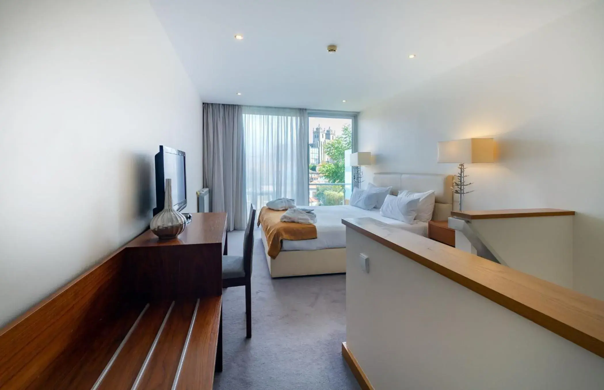 Photo of the whole room, Bed in Oca Vitoria Village Photo of the whole room, Bed in Oca Vitoria Village