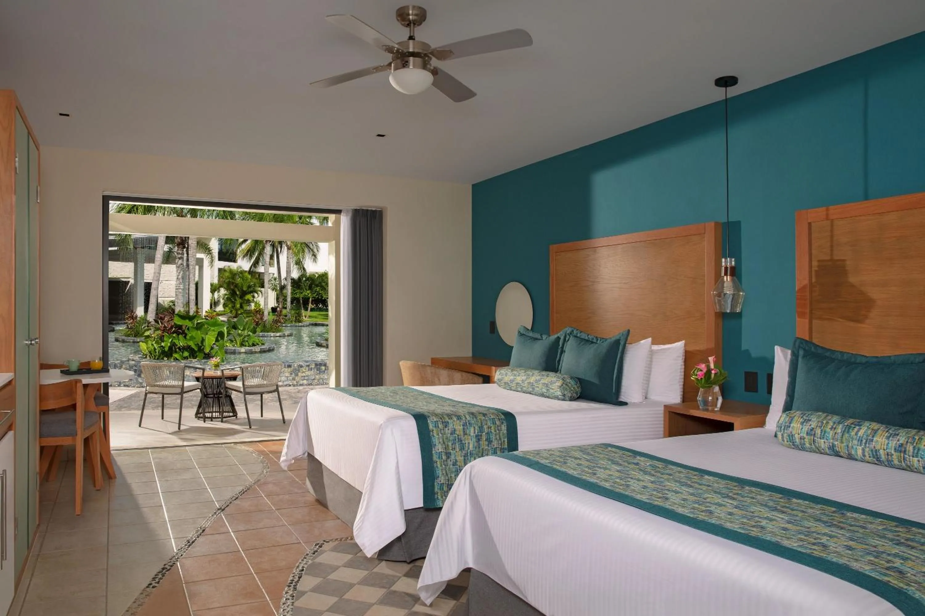 Bed in Dreams Cozumel Cape Resort & Spa