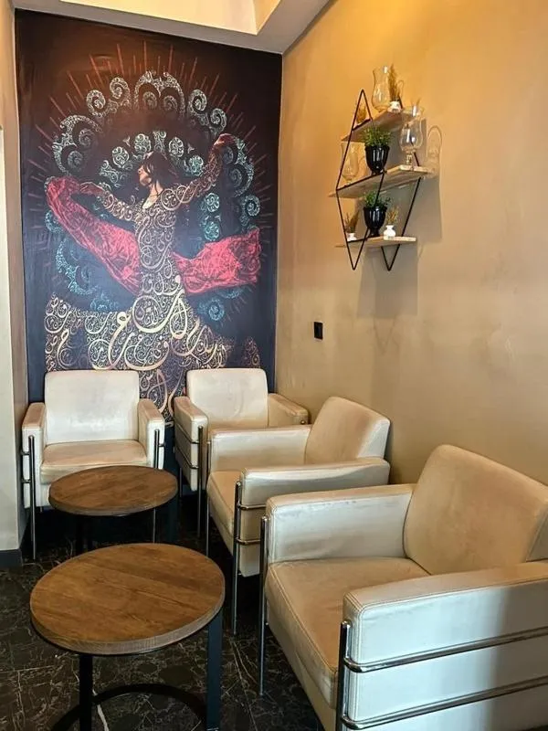 Communal lounge/ TV room in Meva Otel