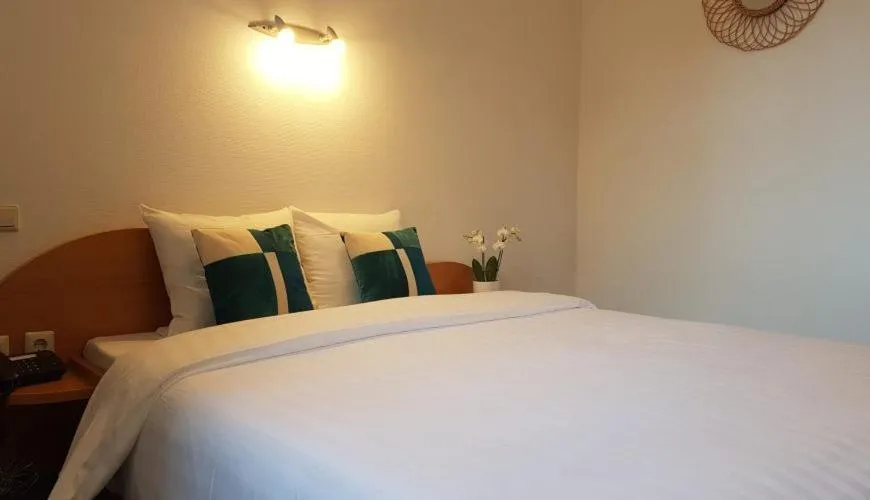 Bed in Hôtel La Charbonnade