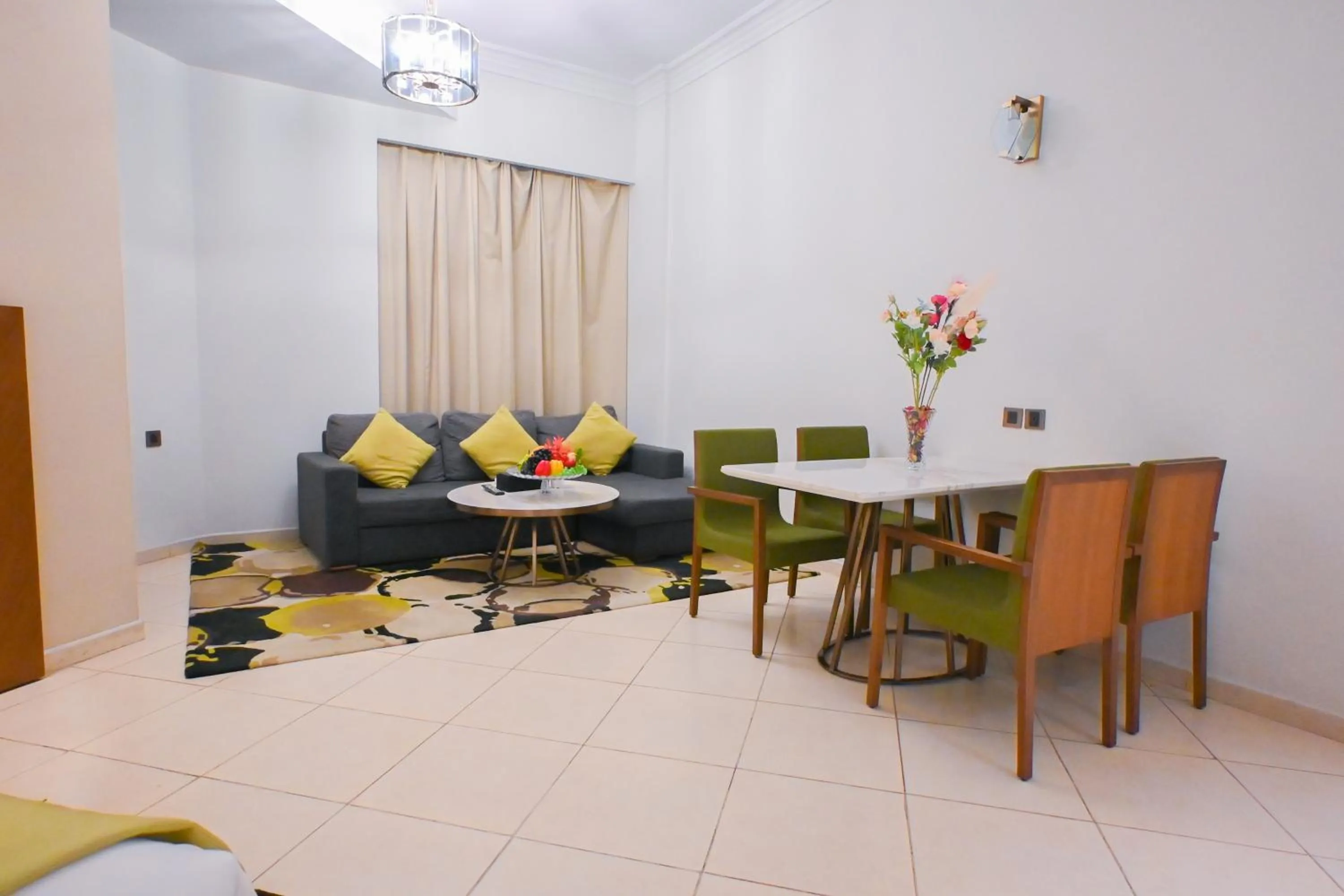 Seating area in Ramee Palace Hotel