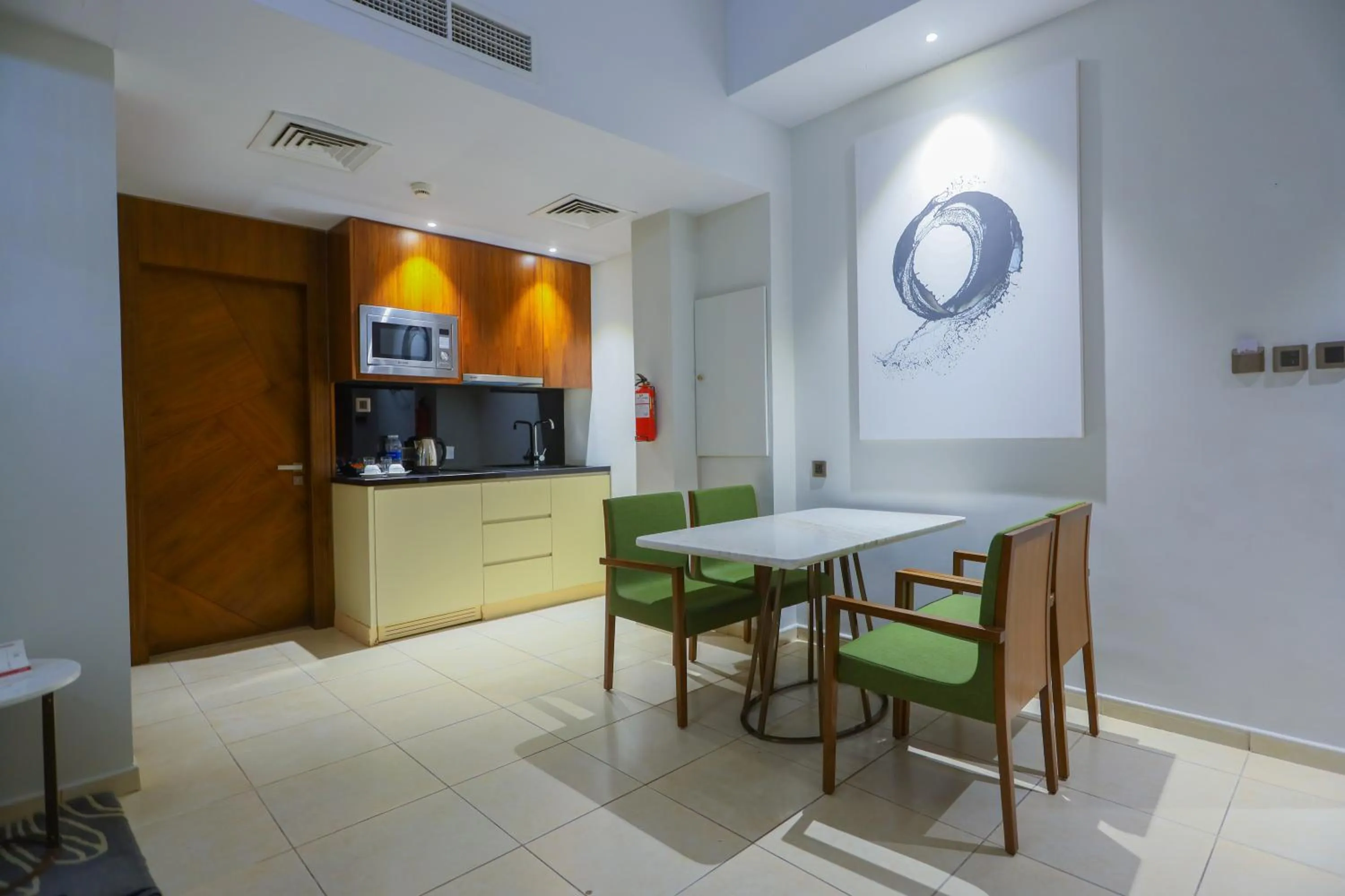 Kitchen or kitchenette in Ramee Palace Hotel