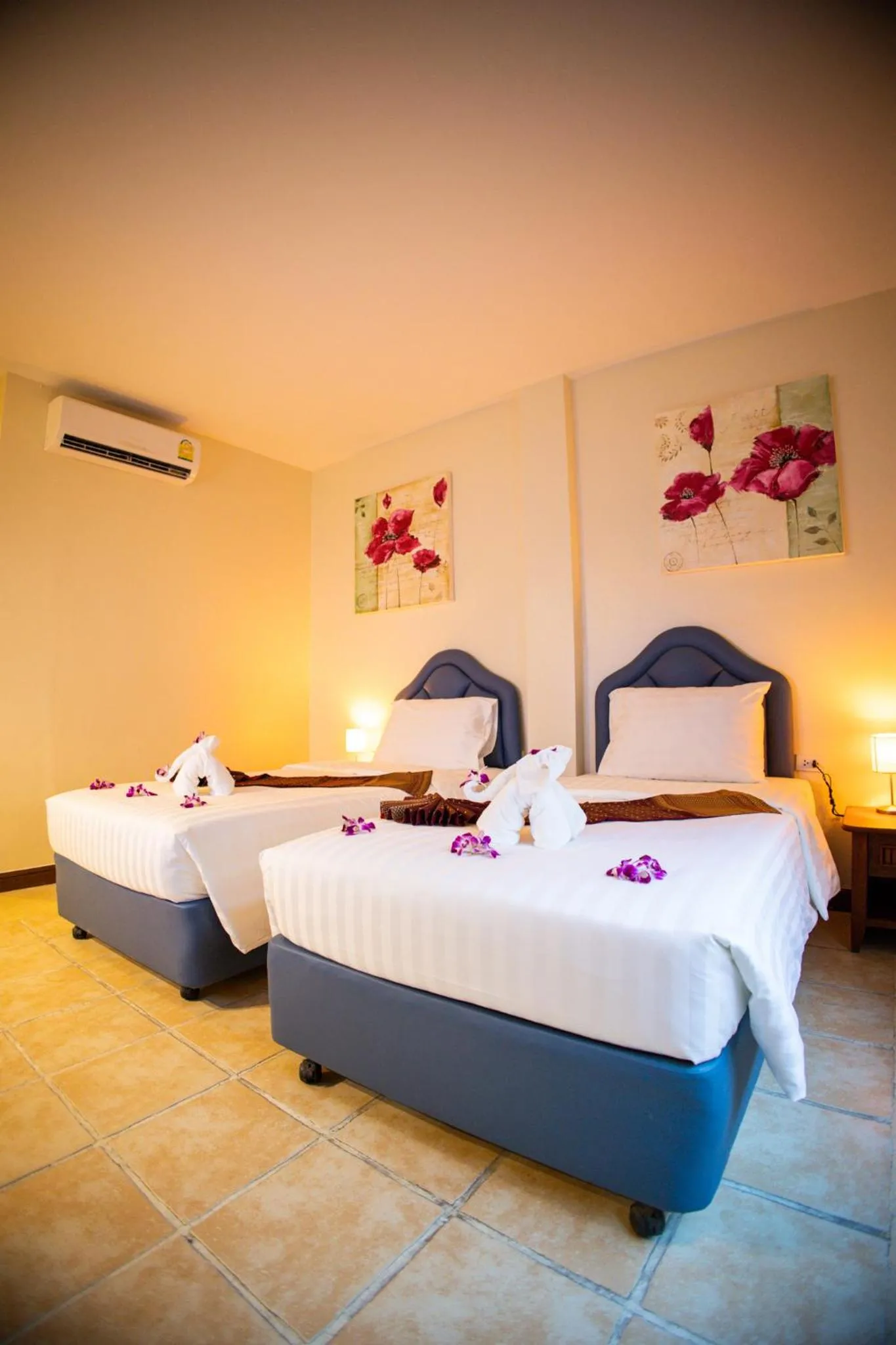 Bed in Rico's Patong Hotel