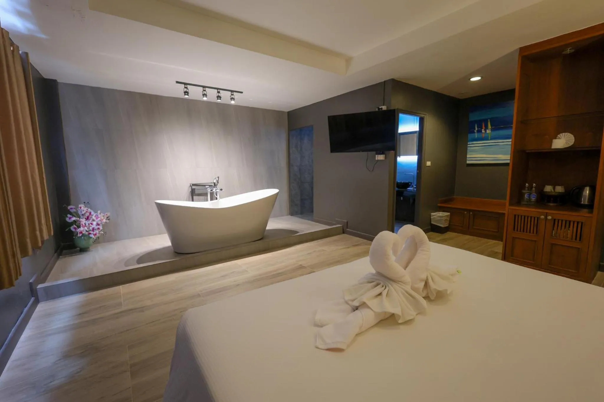 Bed in Rico's Patong Hotel