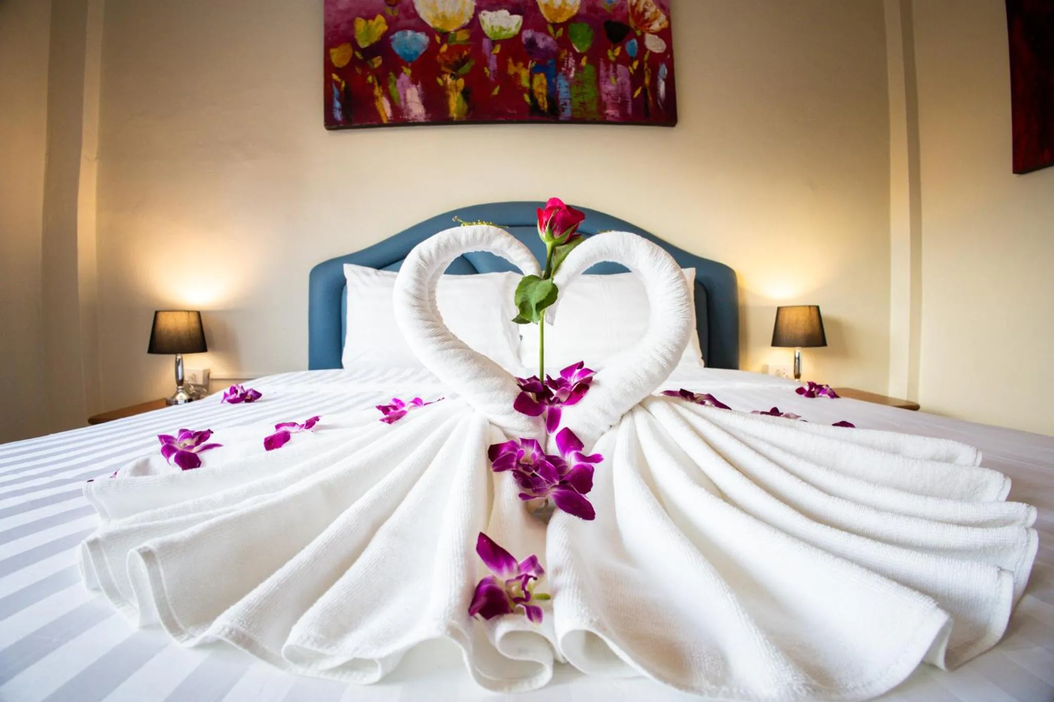 Bed in Rico's Patong Hotel