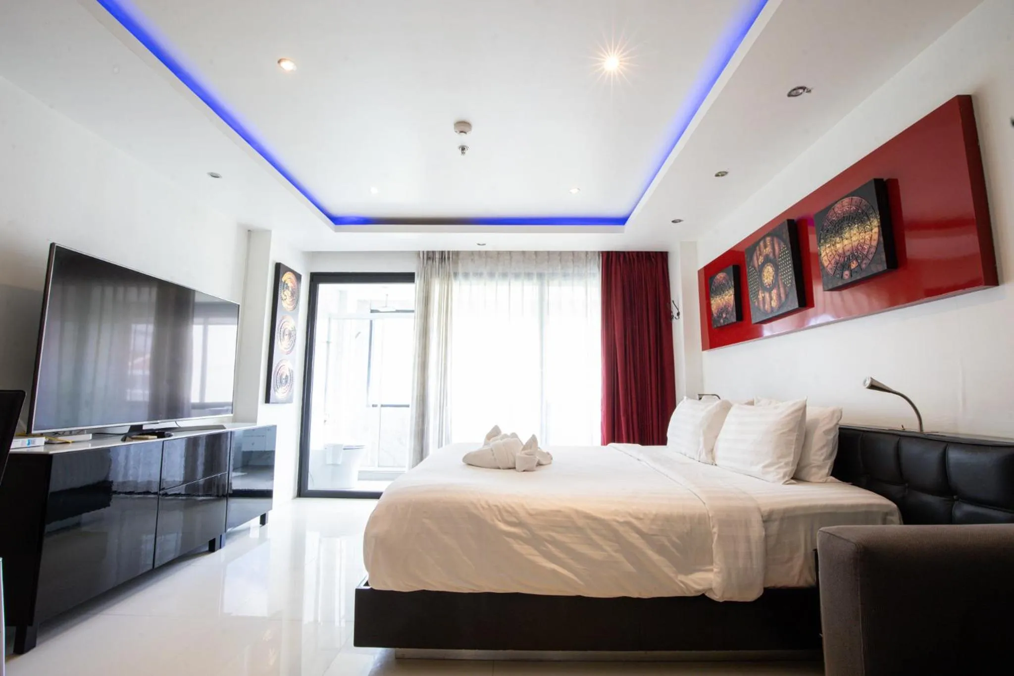 Bed in Rico's Patong Hotel