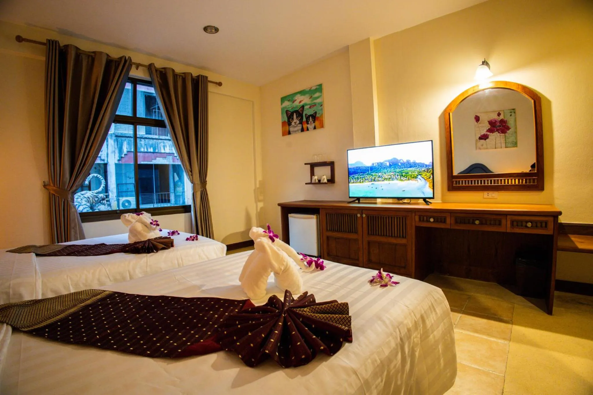 Bed in Rico's Patong Hotel