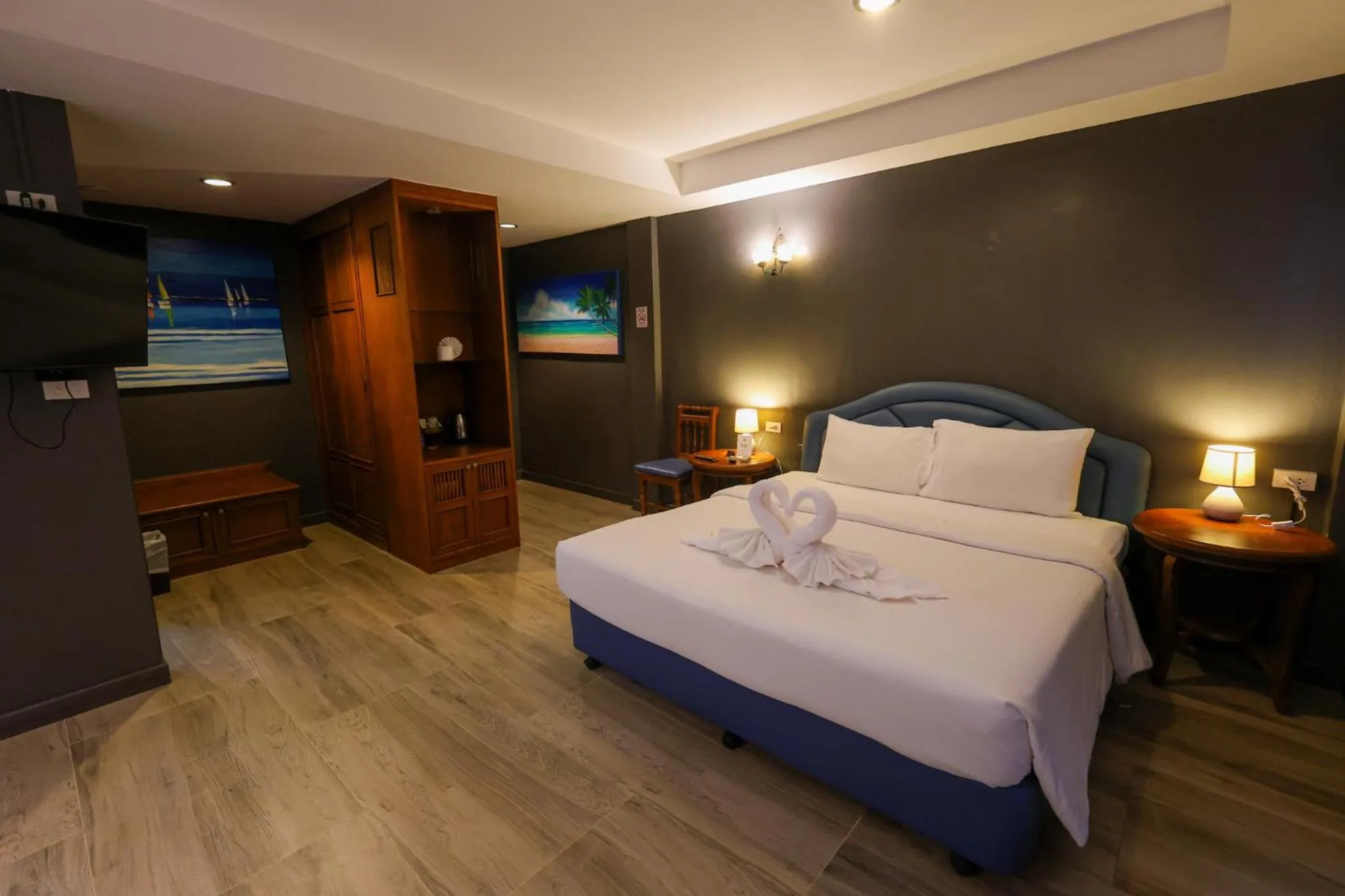 Bed in Rico's Patong Hotel