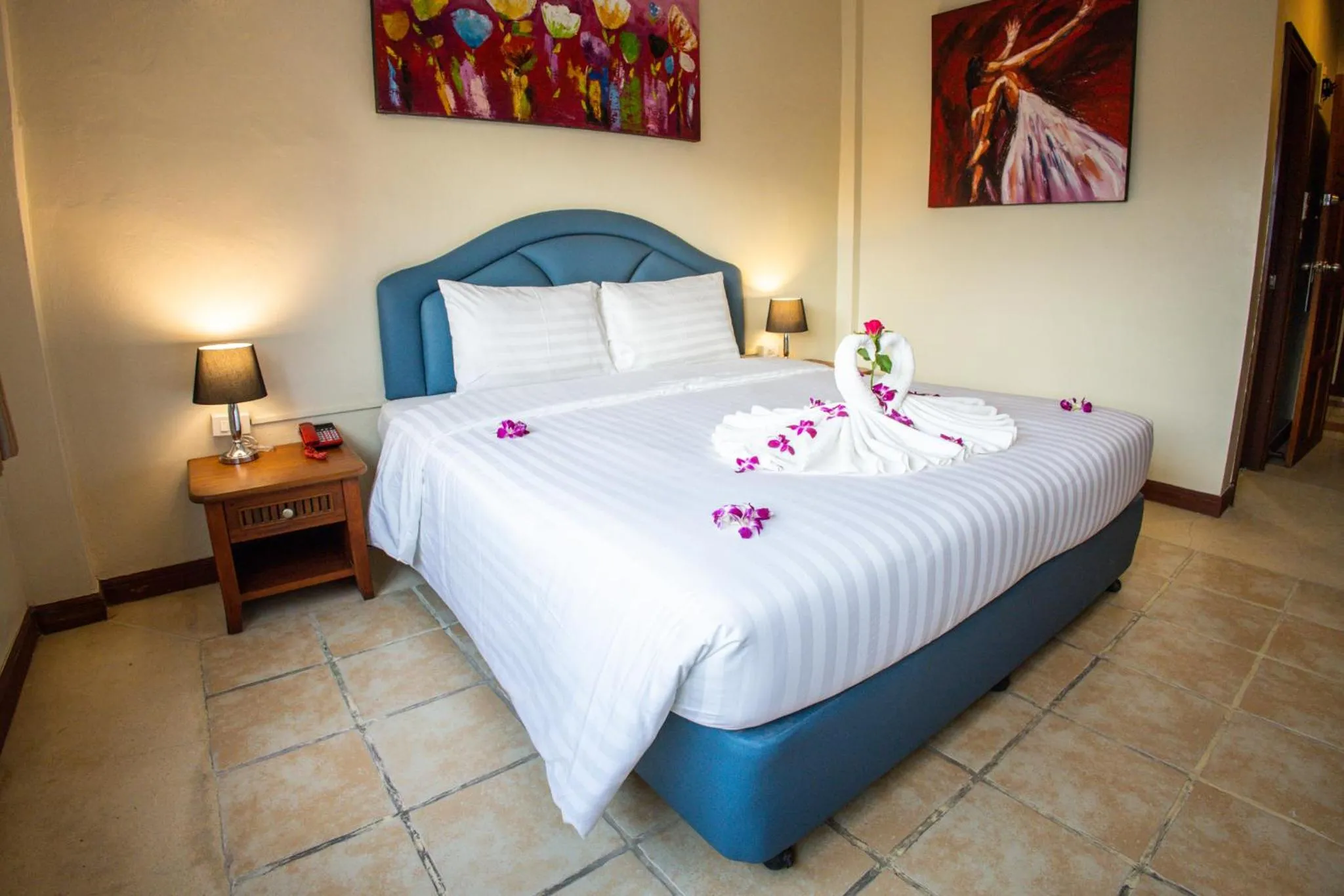 Bed in Rico's Patong Hotel