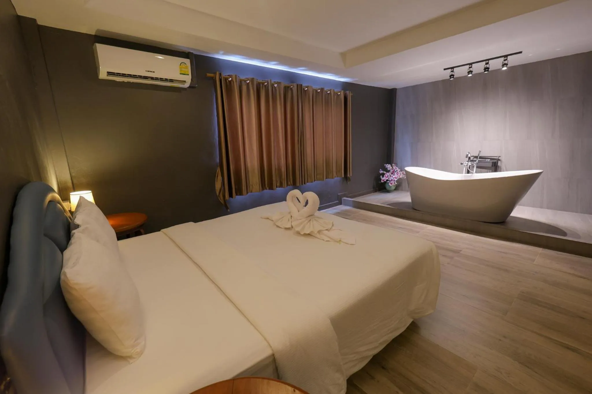 Bed in Rico's Patong Hotel