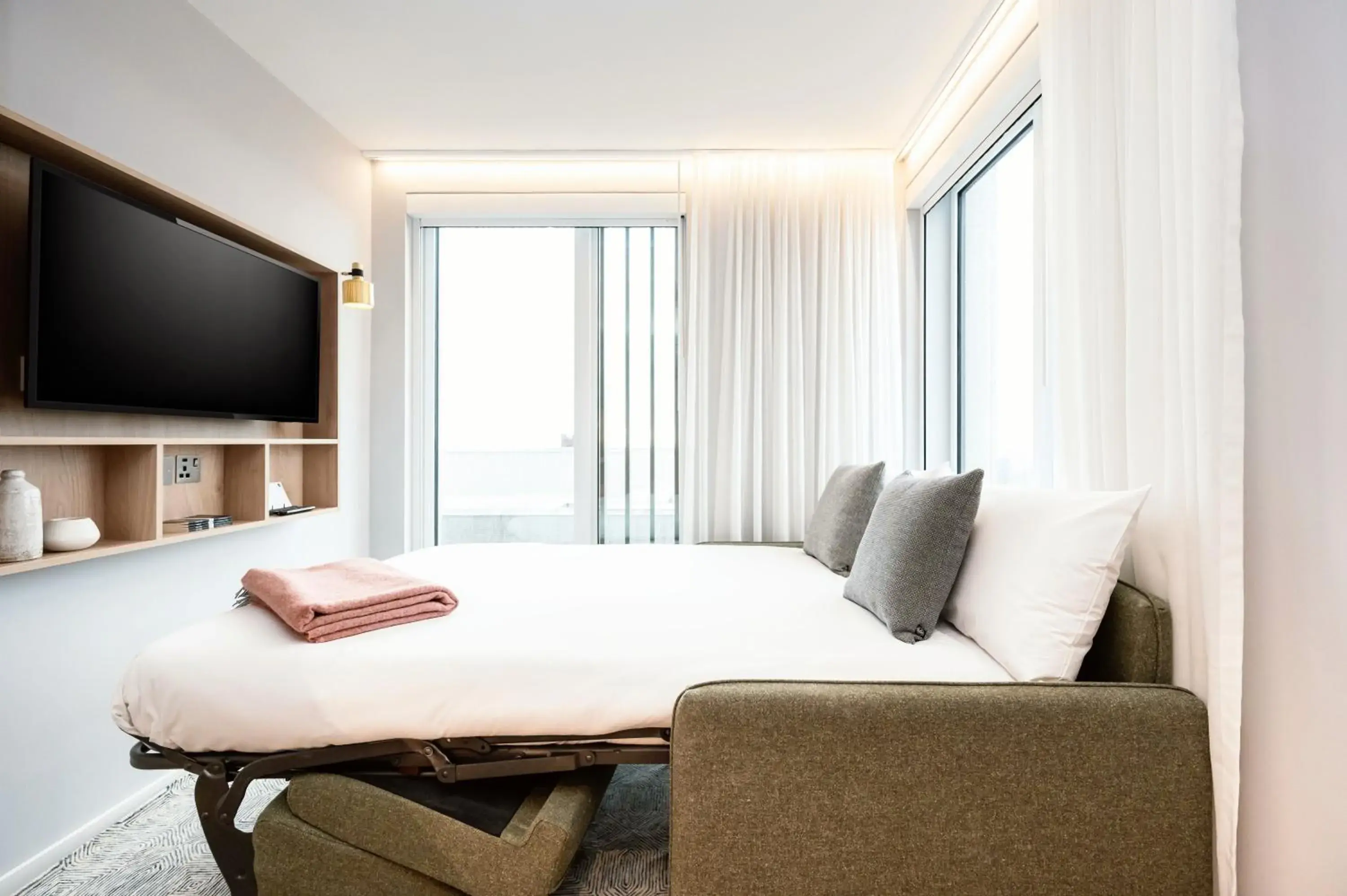 Living room, Bed in Wilde Aparthotels Manchester City Centre Living room, Bed in Wilde Aparthotels Manchester City Centre