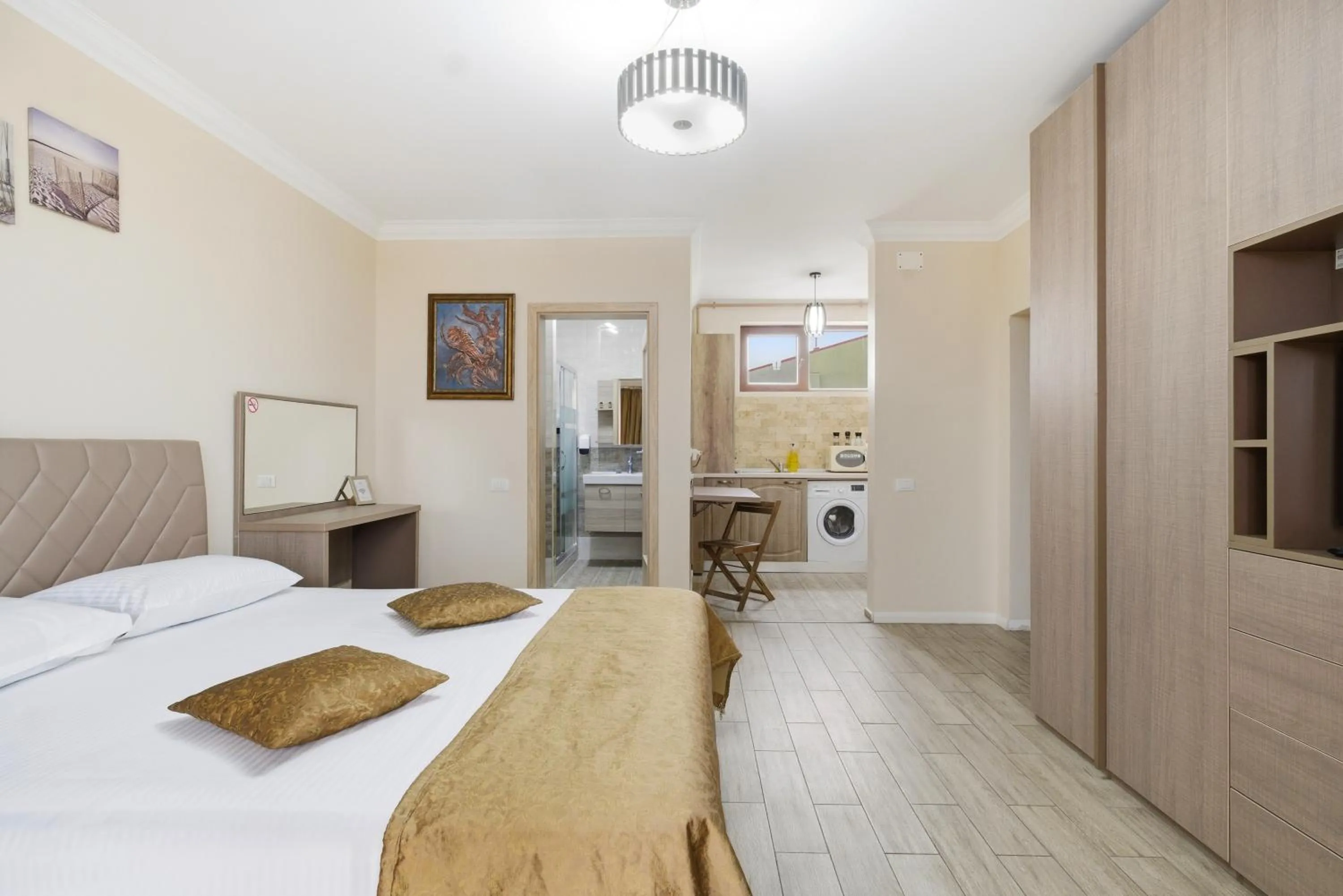 Bed in REYNA APART HOTEL