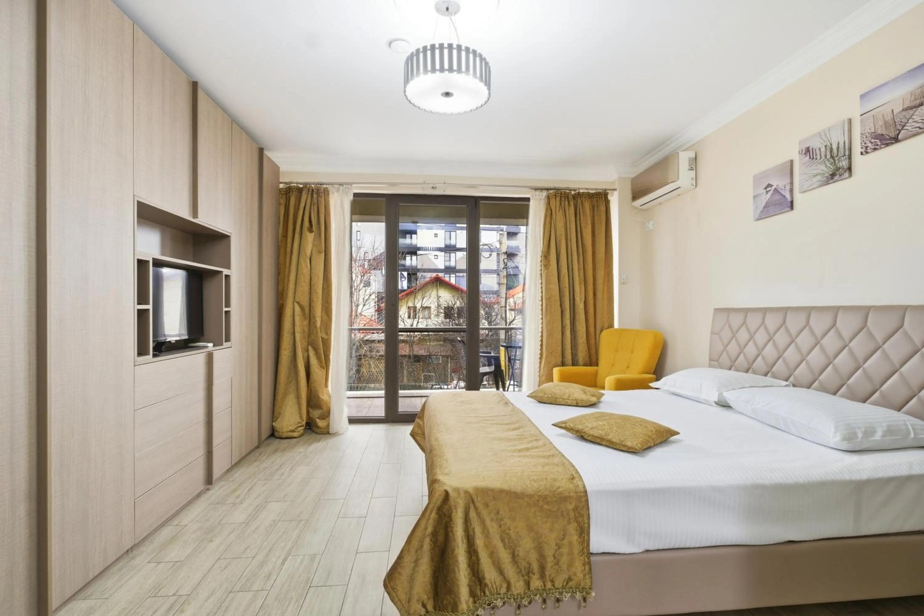 Bed in REYNA APART HOTEL