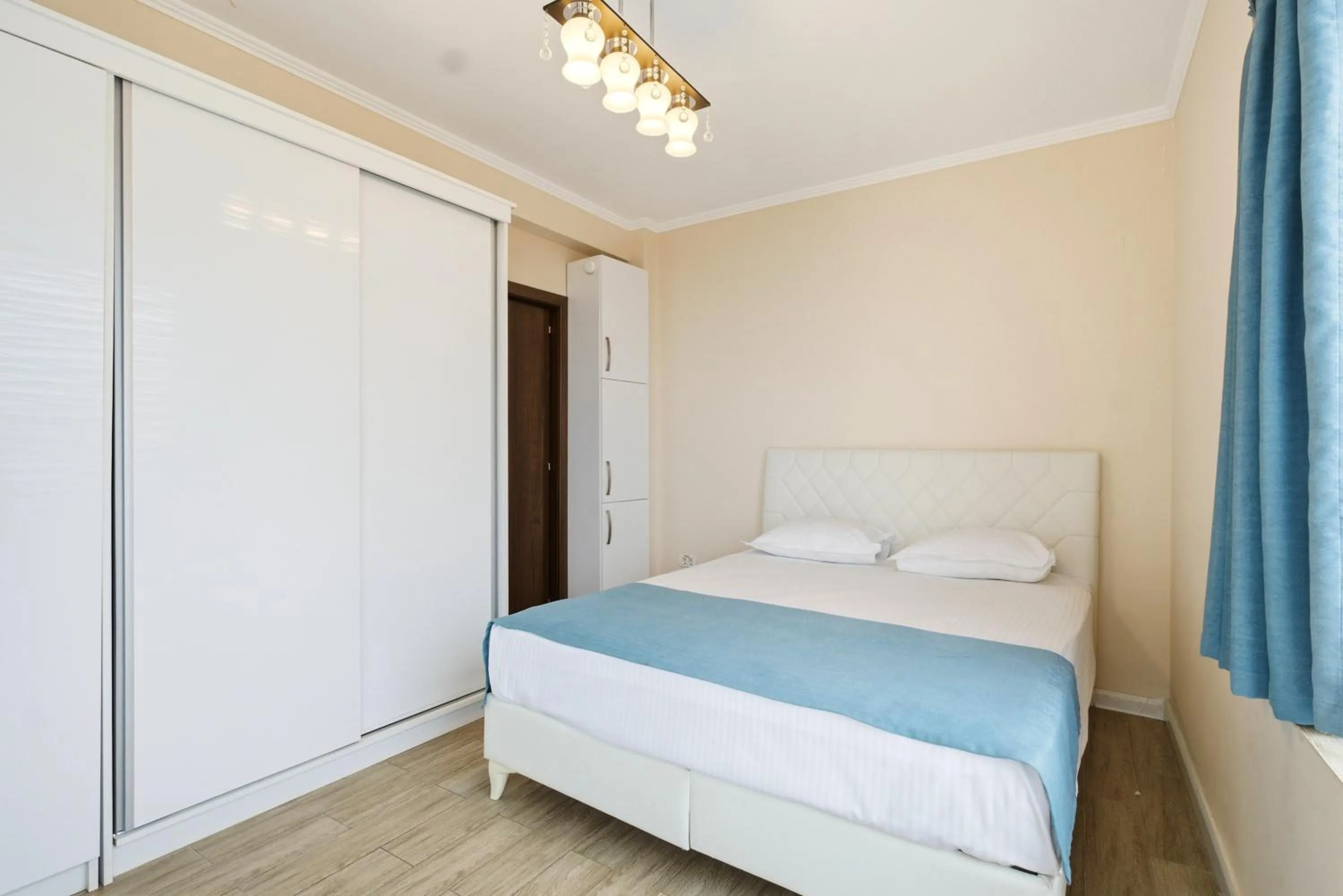 Bed in REYNA APART HOTEL