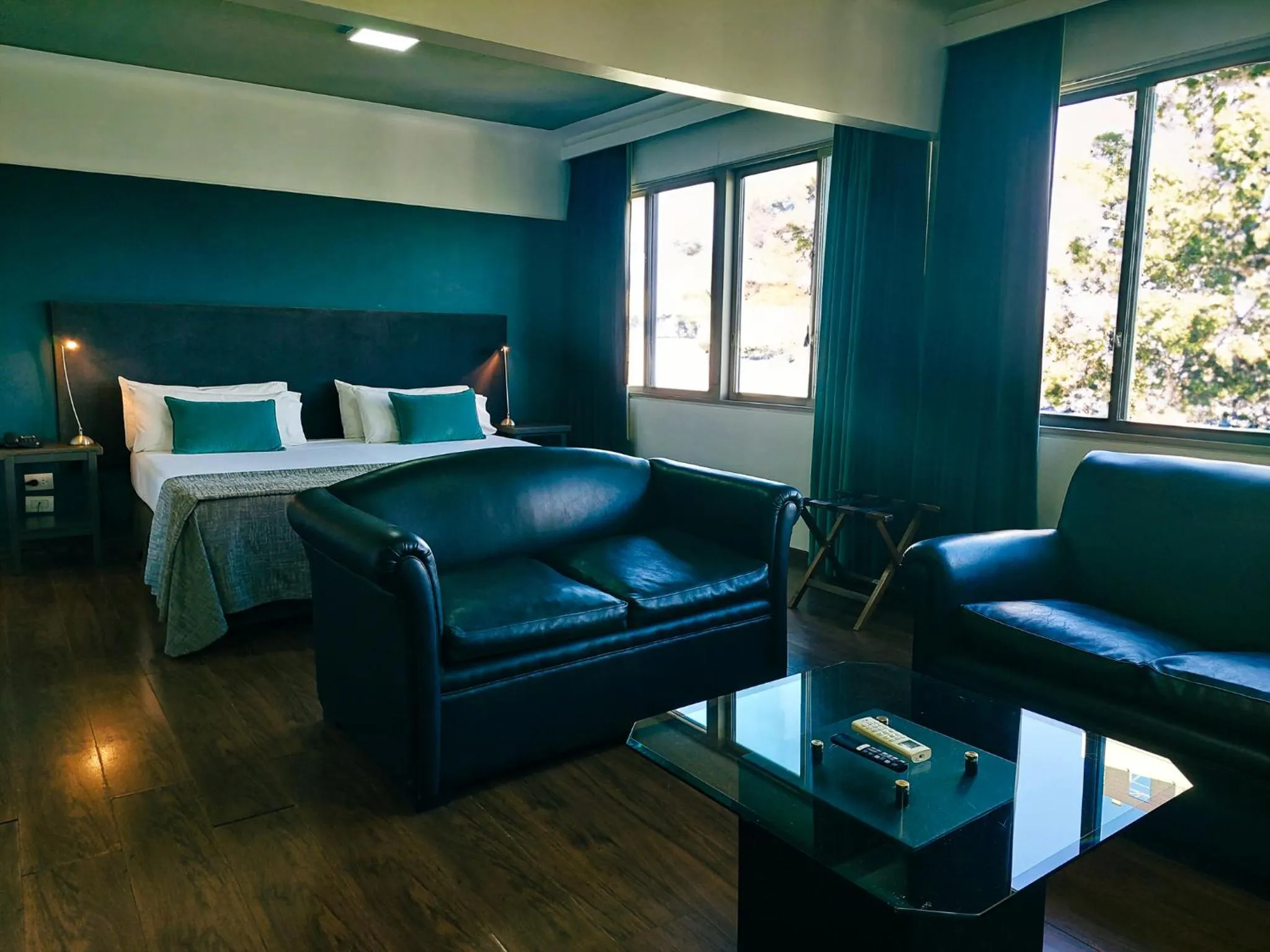 Living room, Bed in Hotel Raices Aconcagua