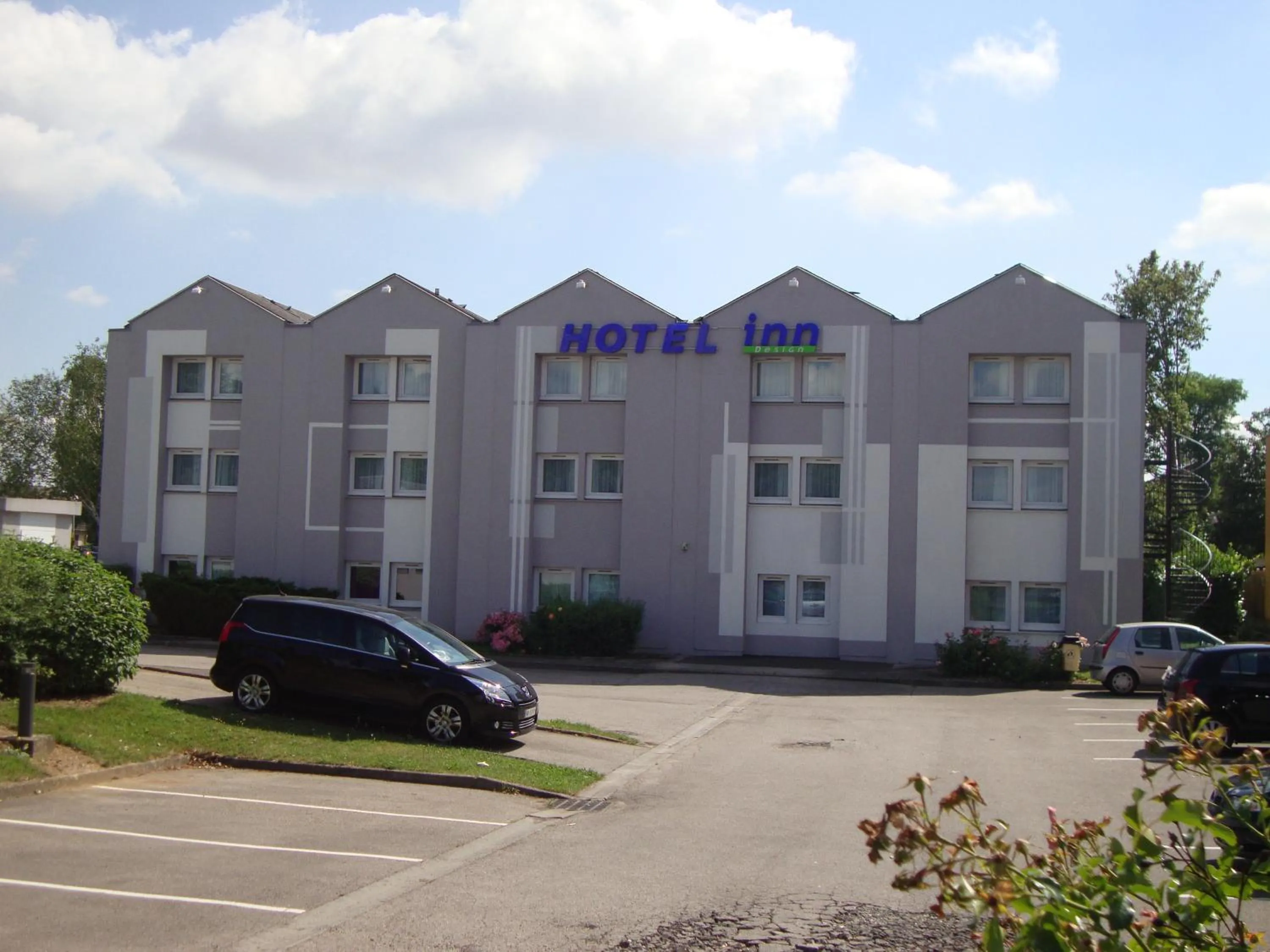 Property building in Hôtel Inn Design Resto Novo Amiens