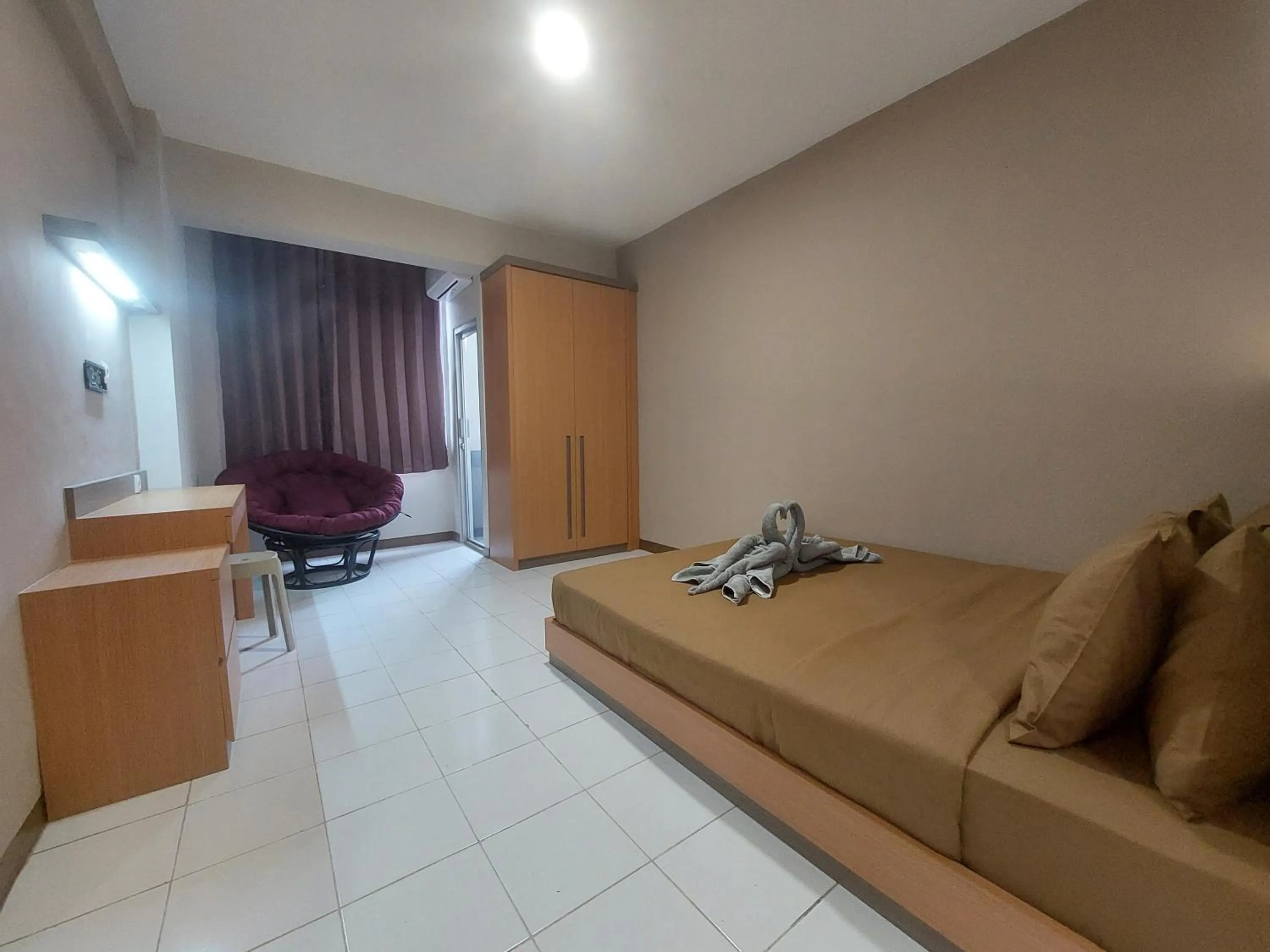 Bedroom in Emerald Apartel