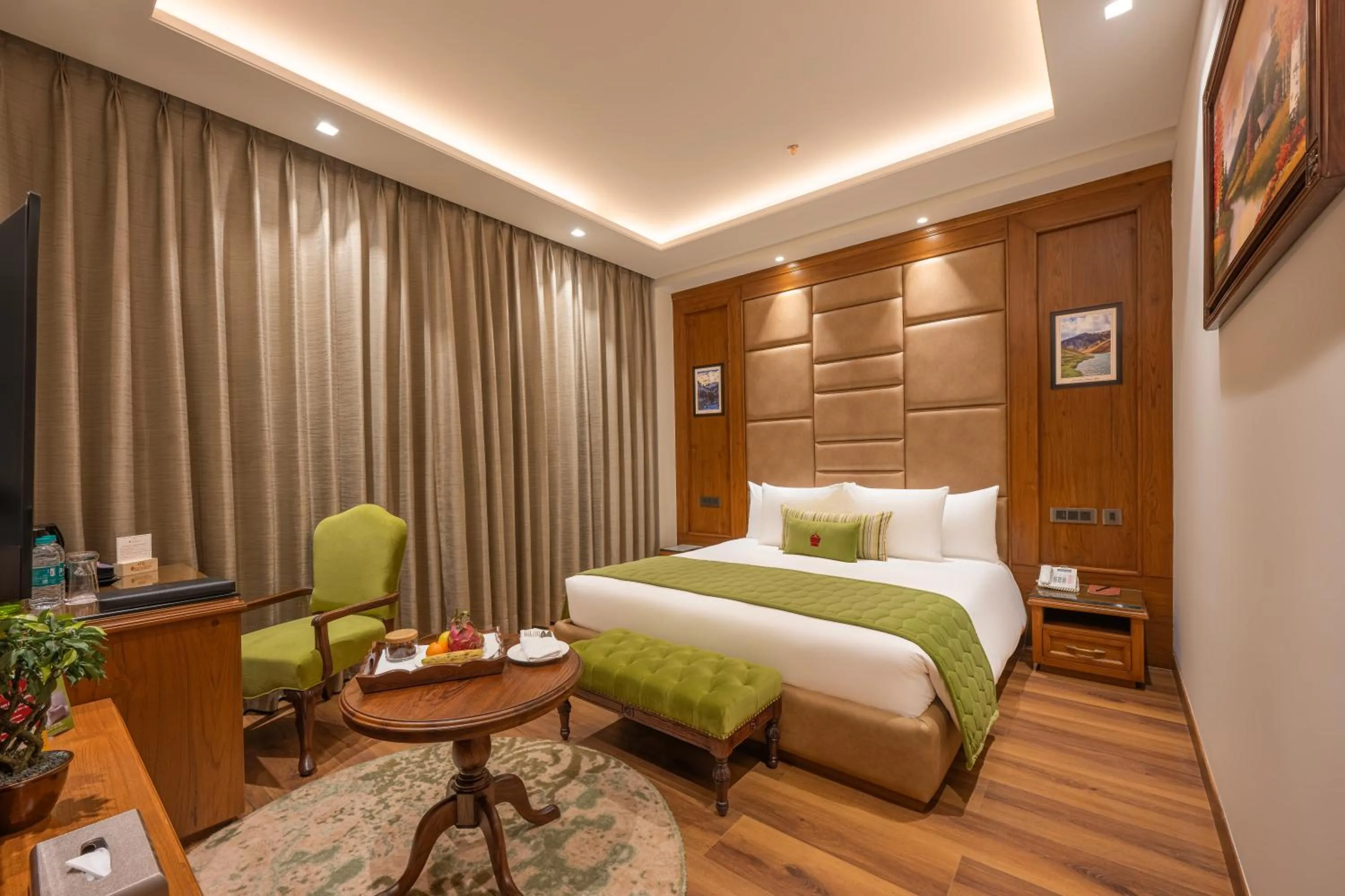 Bed in WelcomHeritage Elysium Resort & Spa