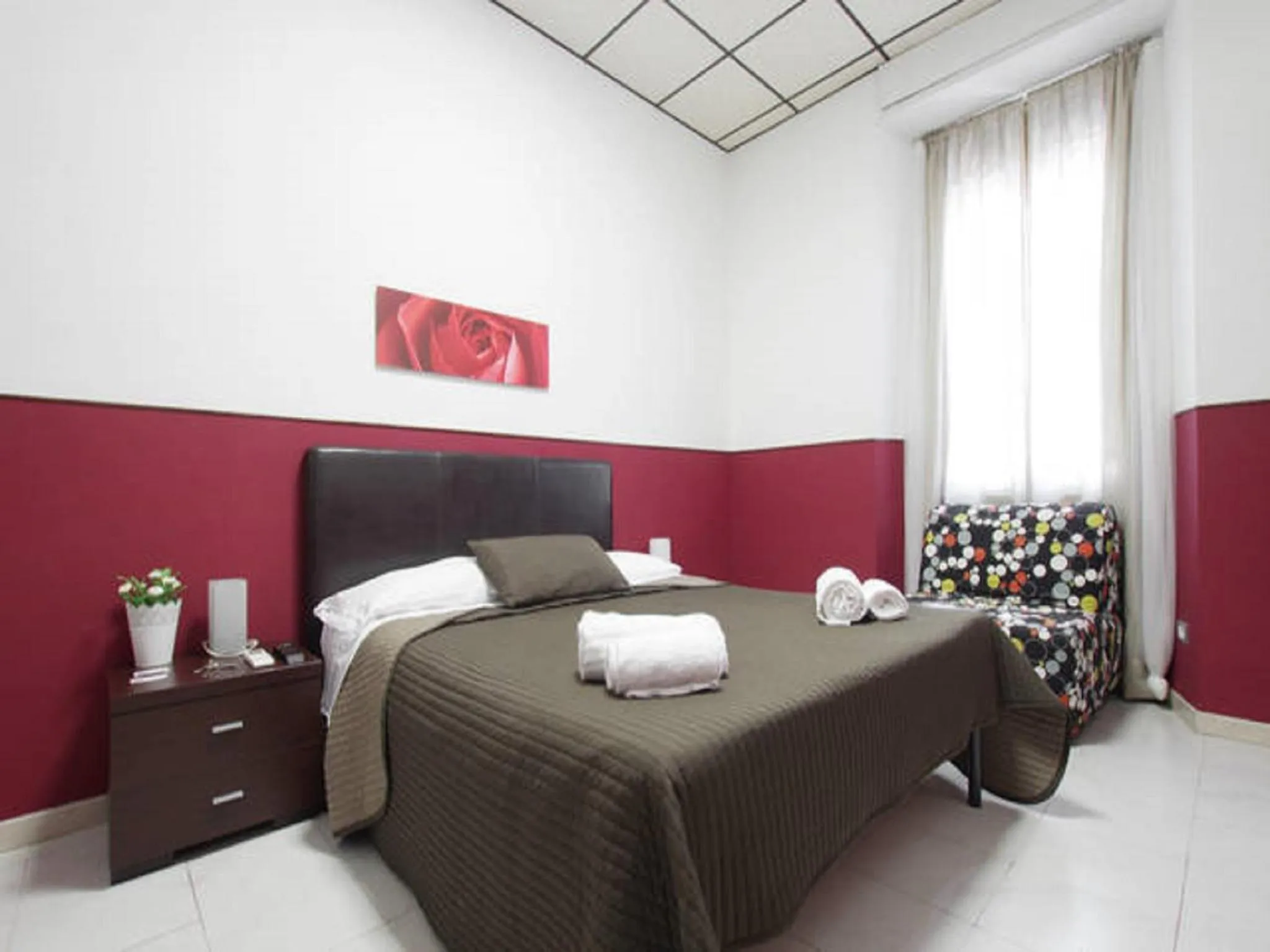 Photo of the whole room, Bed in La Lupa in Trastevere