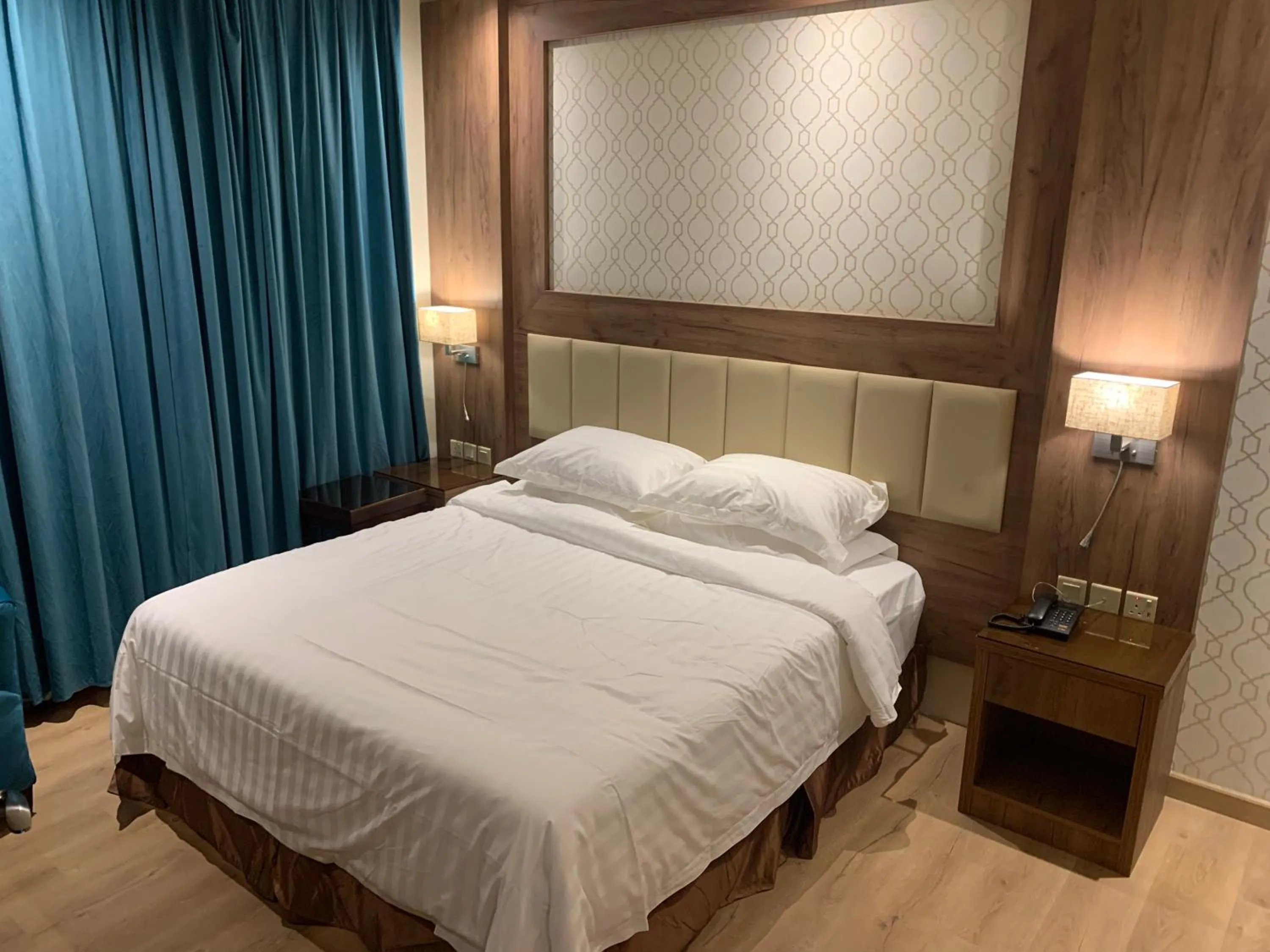 Photo of the whole room, Bed in Fanan Suites Serviced Apartments Economy