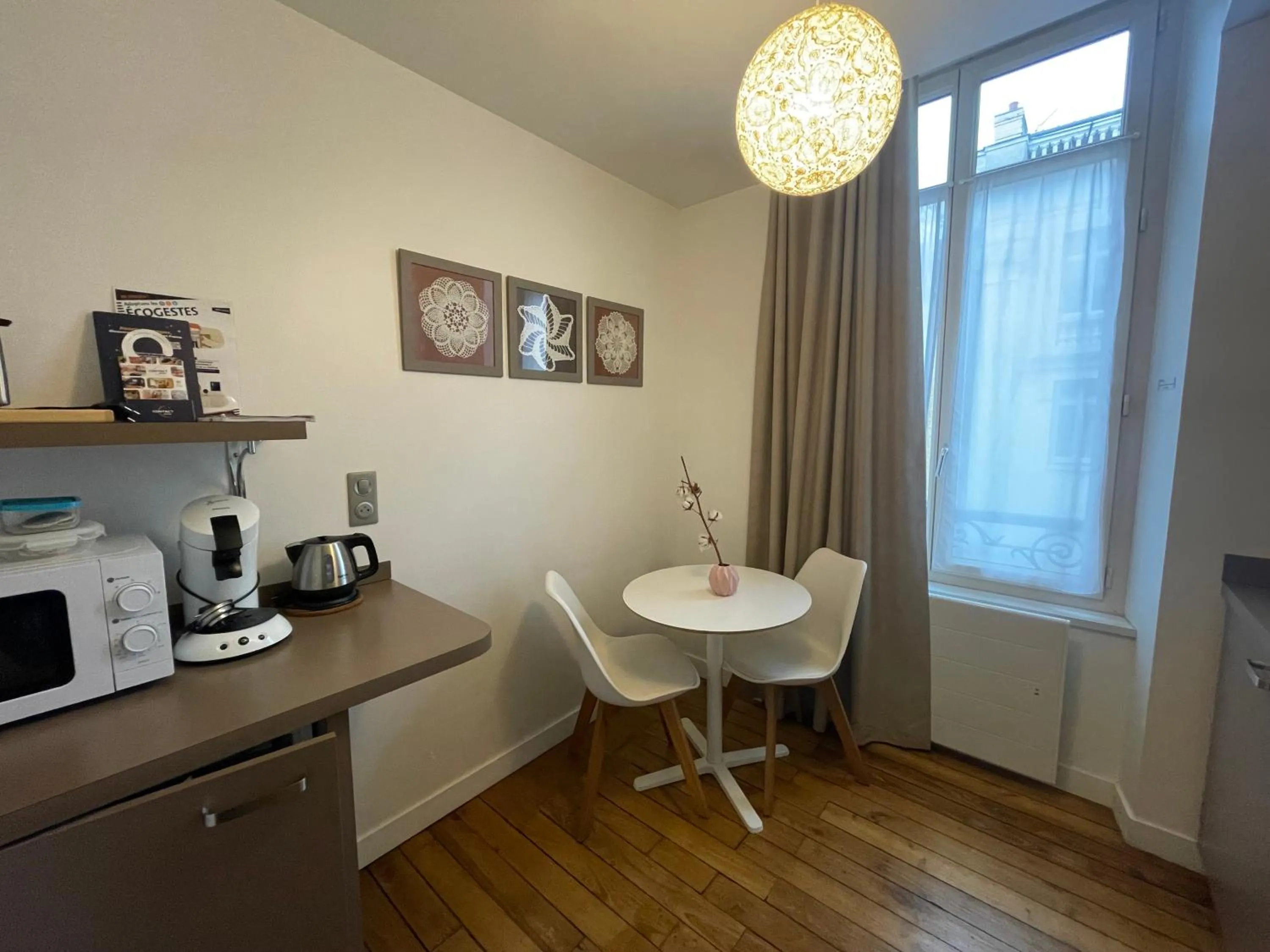 Kitchen or kitchenette in Garden Hotel Rennes Centre Gare