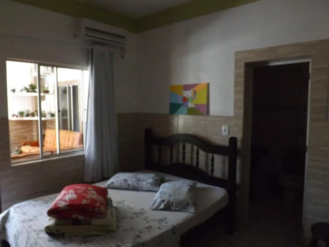 Bed in Pousada Anjo Gabriel