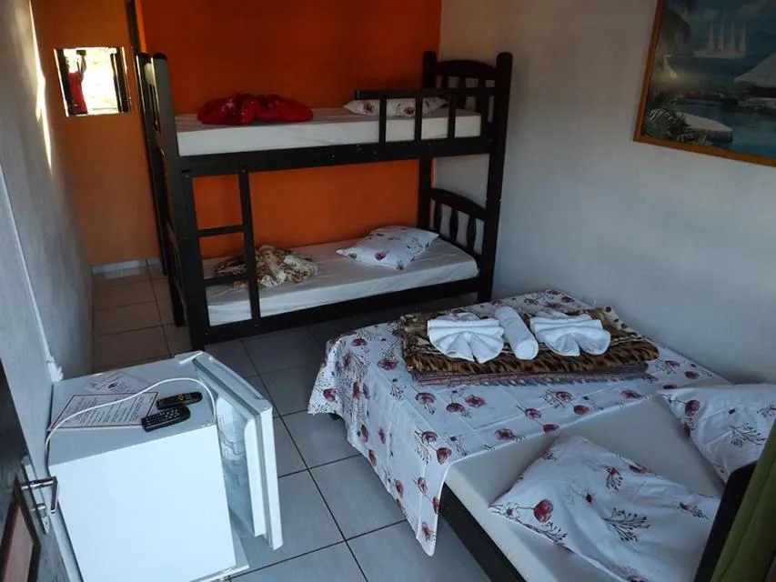 Bed in Pousada Anjo Gabriel