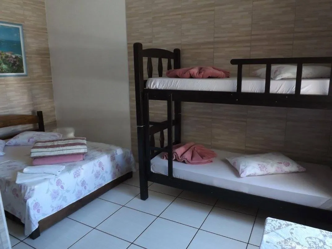 Bed in Pousada Anjo Gabriel